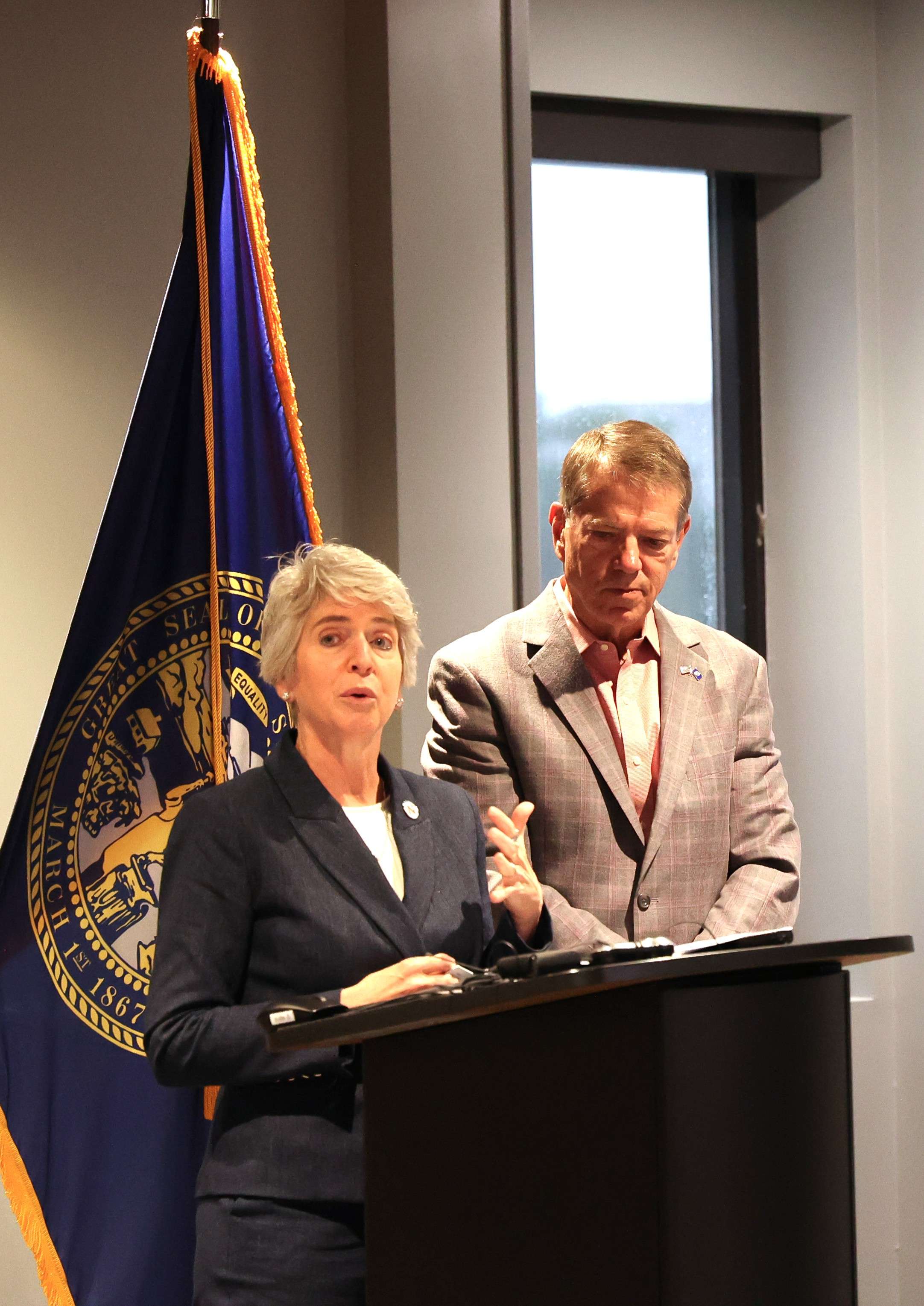 Leah Barrett, president of Northeast Community College, Gov. Pillen