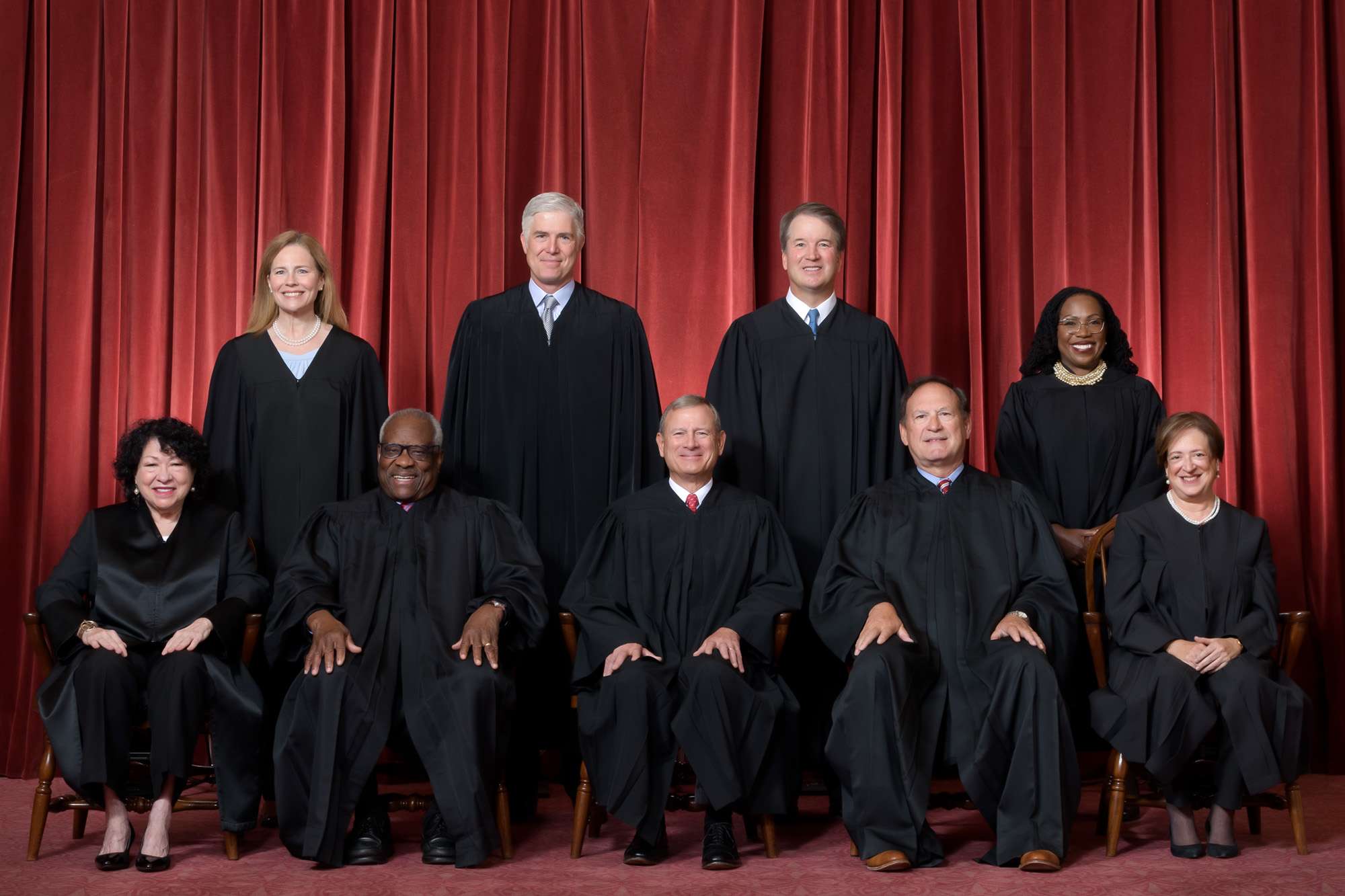 Front (left to right) - Associate Justices Sonia Sotomayor, Clarence Thomas, Chief Justice John G. Roberts, Jr., Associate Justices Samuel A. Alito, Jr. and Elena Kagan. Back (left to right) - Associate Justices Amy Coney Barrett, Neil M. Gorsuch, Brett M. Kavanaugh and Ketanji Brown Jackson (Photo Courtesy Collection of the Supreme Court of the United States)
