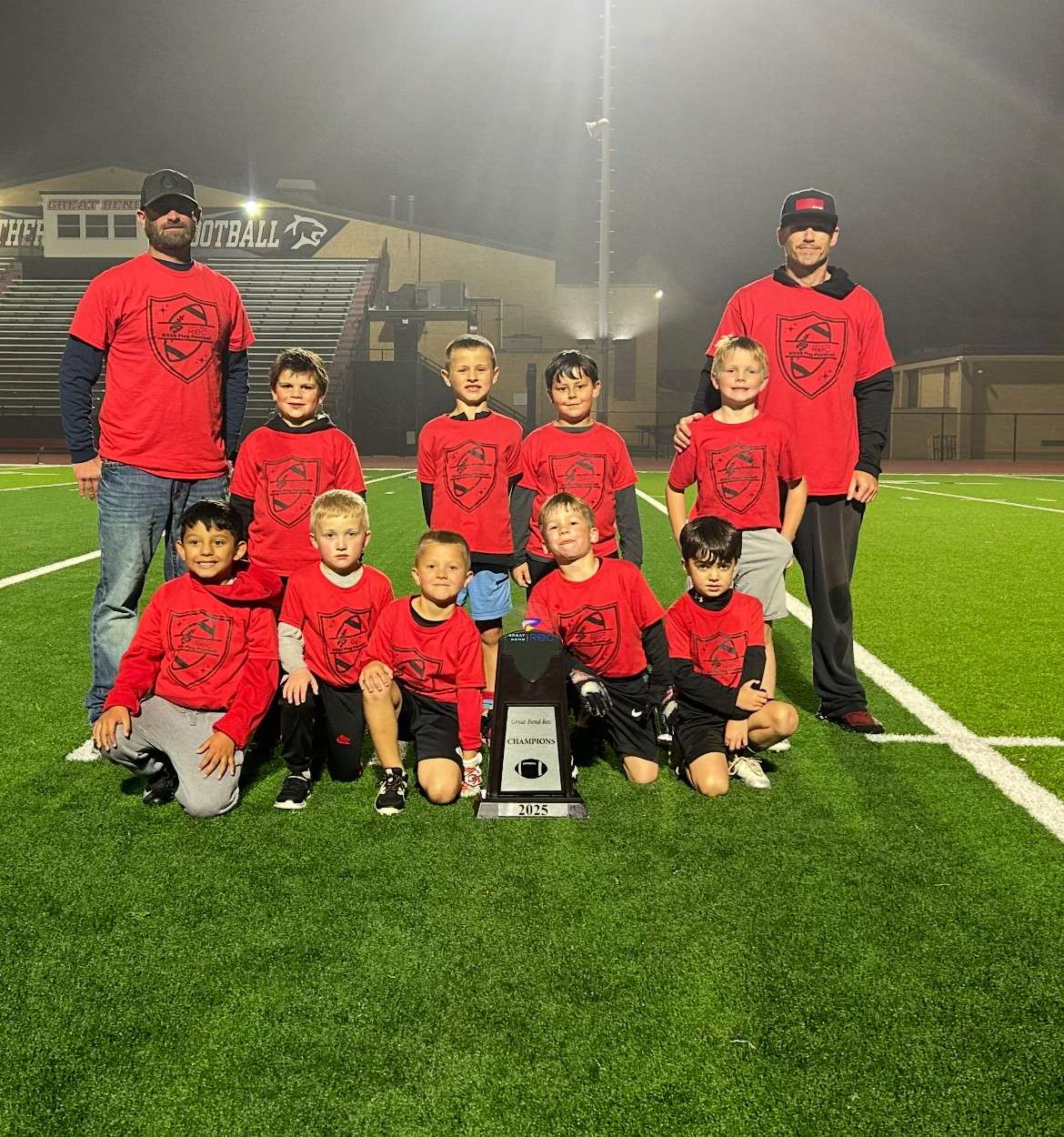 K-1st grade champions - Bulldogs, head coach Justin Clark