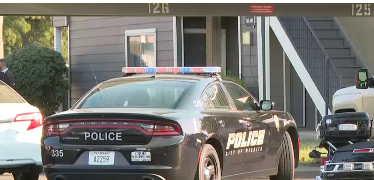 Police on the scene of the investigation -photo courtesy KWCH