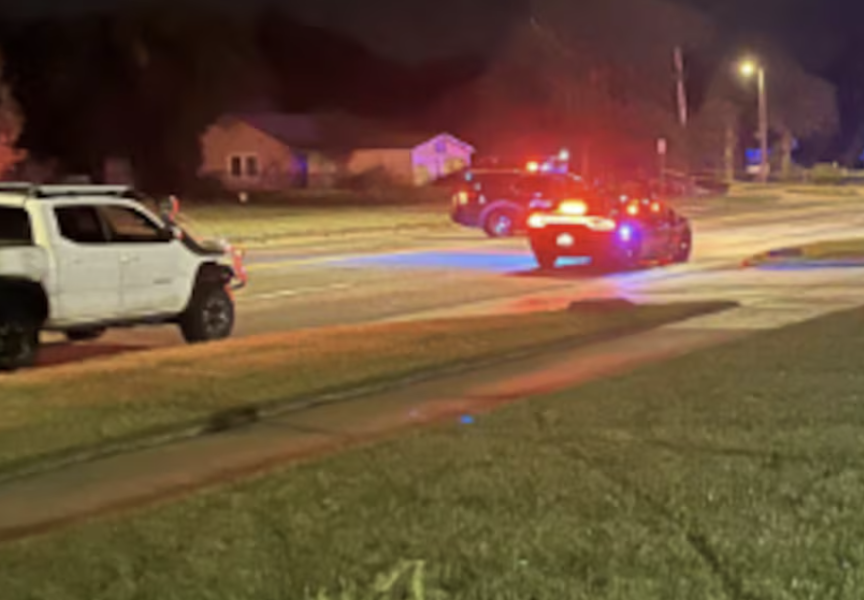 Police near the crash scene photo courtesy KWCH