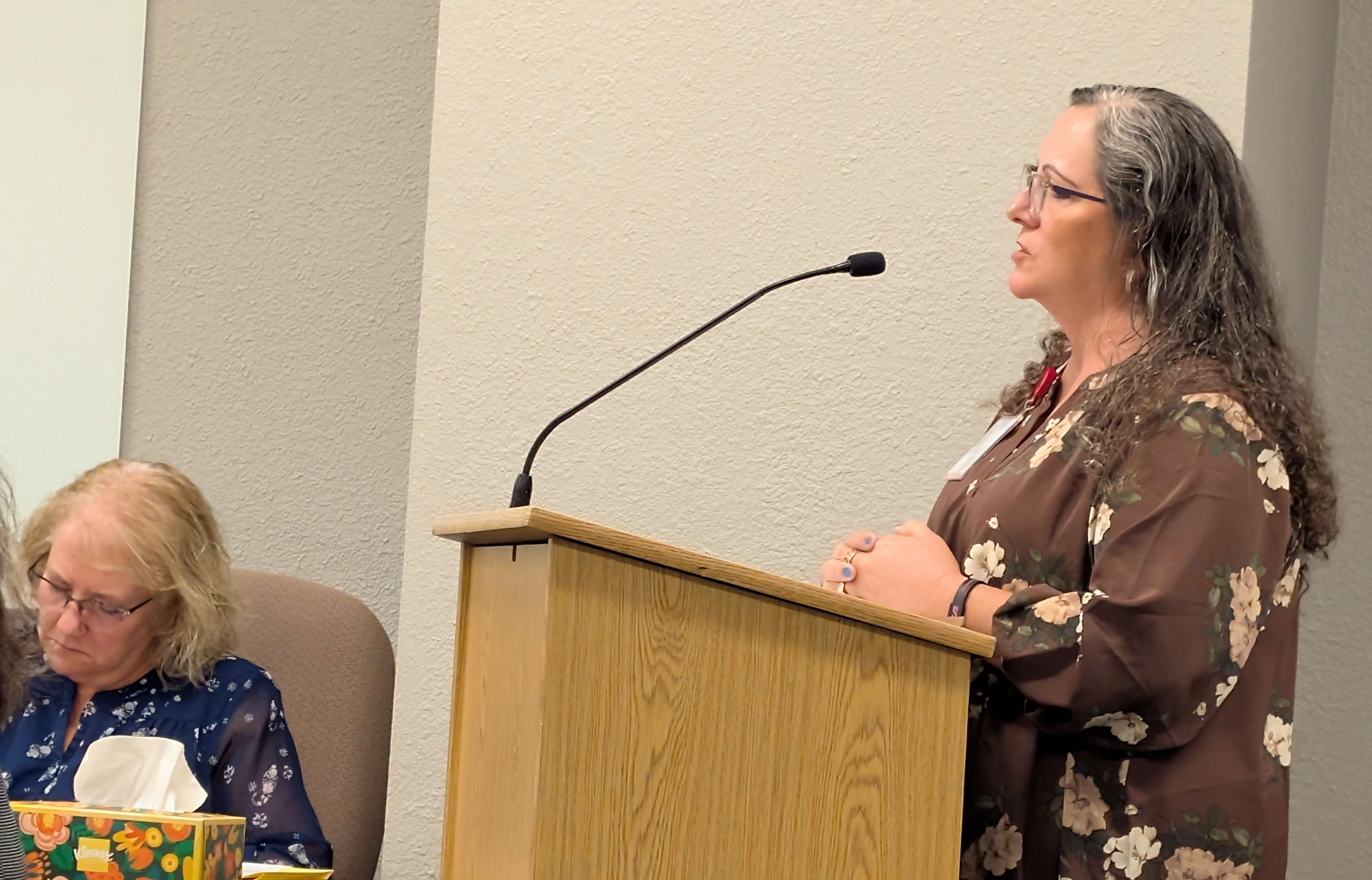 Barton County Environmental Manager Judy Goreham addresses the County Commission Tuesday morning on the planned new cell phone tower near Heizer.