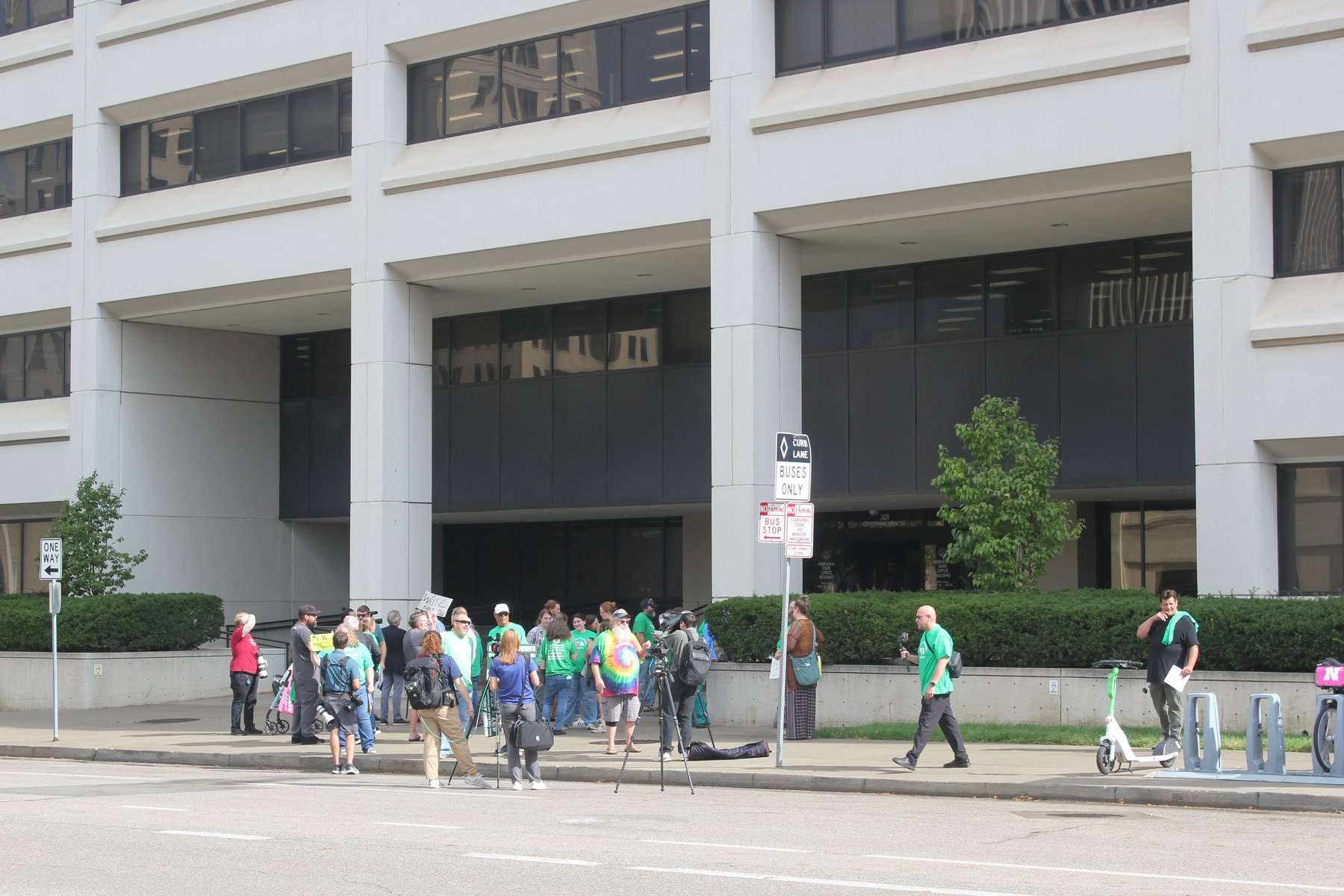 Medical marijuana advocates gather outside of the Nebraska State Office Building for an "Hour of Action" ahead of the hearing on proposed cannabis regulations Wednesday afternoon. (Brian Beach/Nebraska Public Media News).jpg