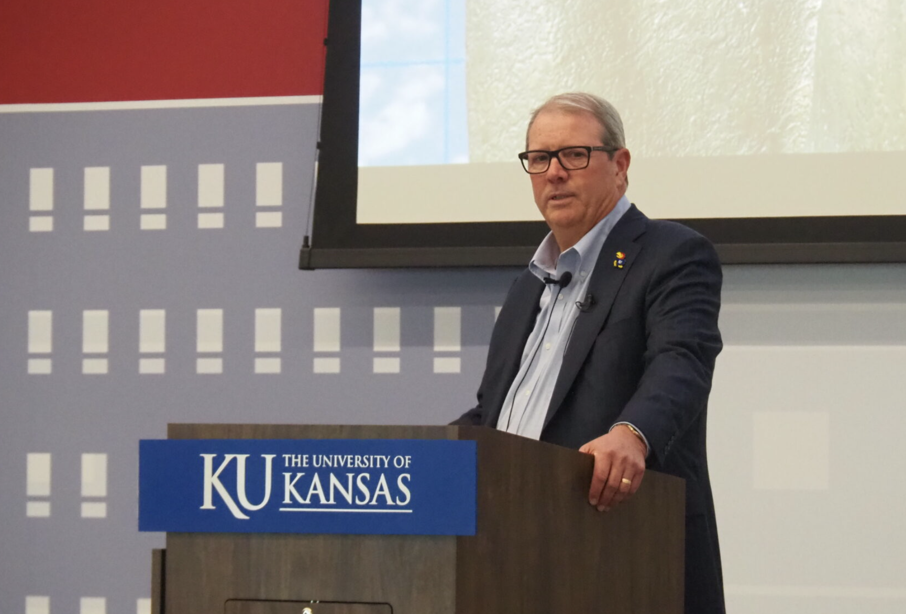 Doug Girod, chancellor at the University of Kansas, participated in a White House virtual meeting about President Donald Trump’s campaign to exchange special access to federal funding or grants when colleges and universities agree to freeze tuition, limit international student enrollment, ban DEI and transgender policies and restrain employees from sharing political views on behalf of a higher education institution. In this Oct. 17, 2025, image, Girod delivers the annual State of the University speech at KU. (Photo taken by Tim Carpenter/Kansas Reflector)