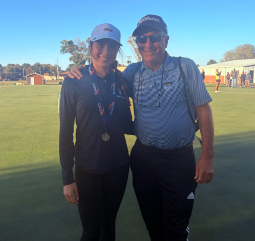 TMP-Marian's Brynn Schoepf and coach Dave Ward at the 3-2-1A state golf tournament in Salina, Kan. (Courtesy photo)