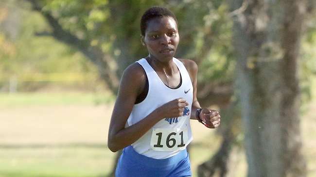 Mildred Rono won the Region 6 individual championship and led the No. 11 Blue Dragon women to a Region 6 team title on Friday in Colby. (Photo courtesy Michael Smith)