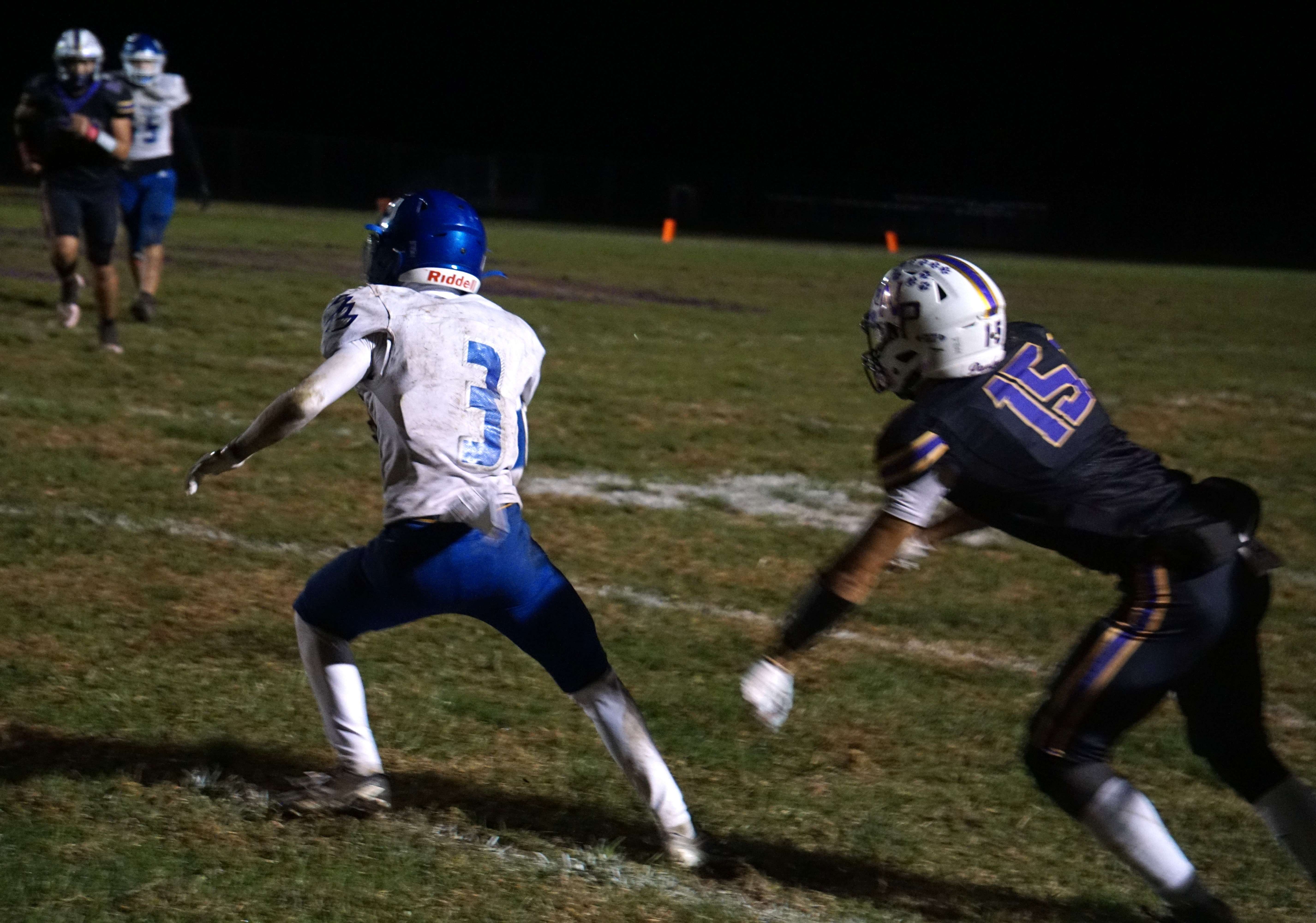 West Platte's Joe Blake (3) spins away from North Platte's Logan Manville (15)/ Photo by Matt Pike