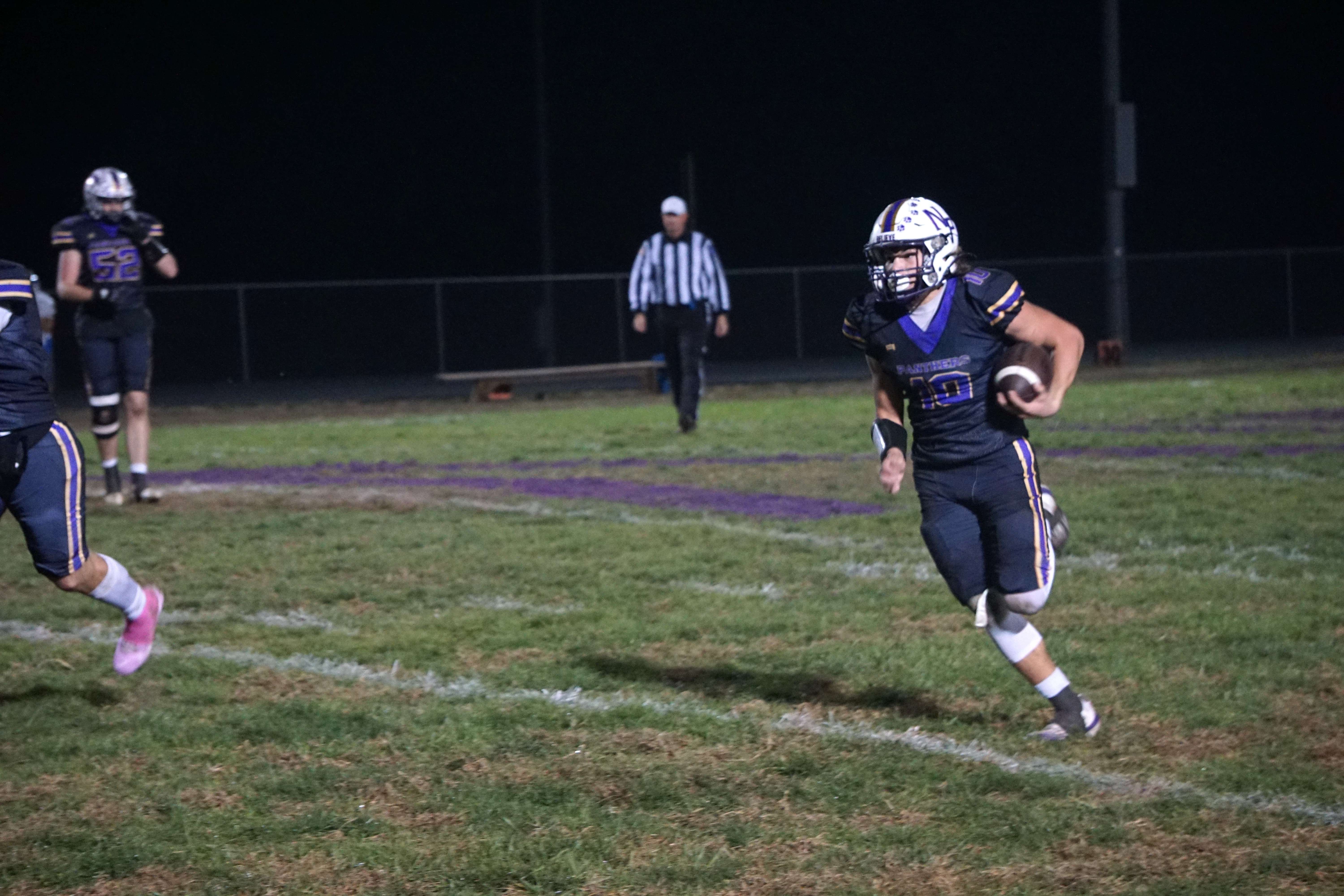 North Platte's Gus French runs around the edge/ Photo by Matt Pike