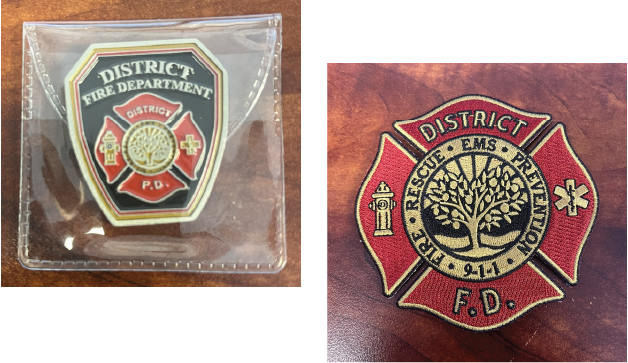 Challenge Coin and Patch presented by District Fire Department, Fla. to Engineer Jacob Younger (Hutch Post photo)