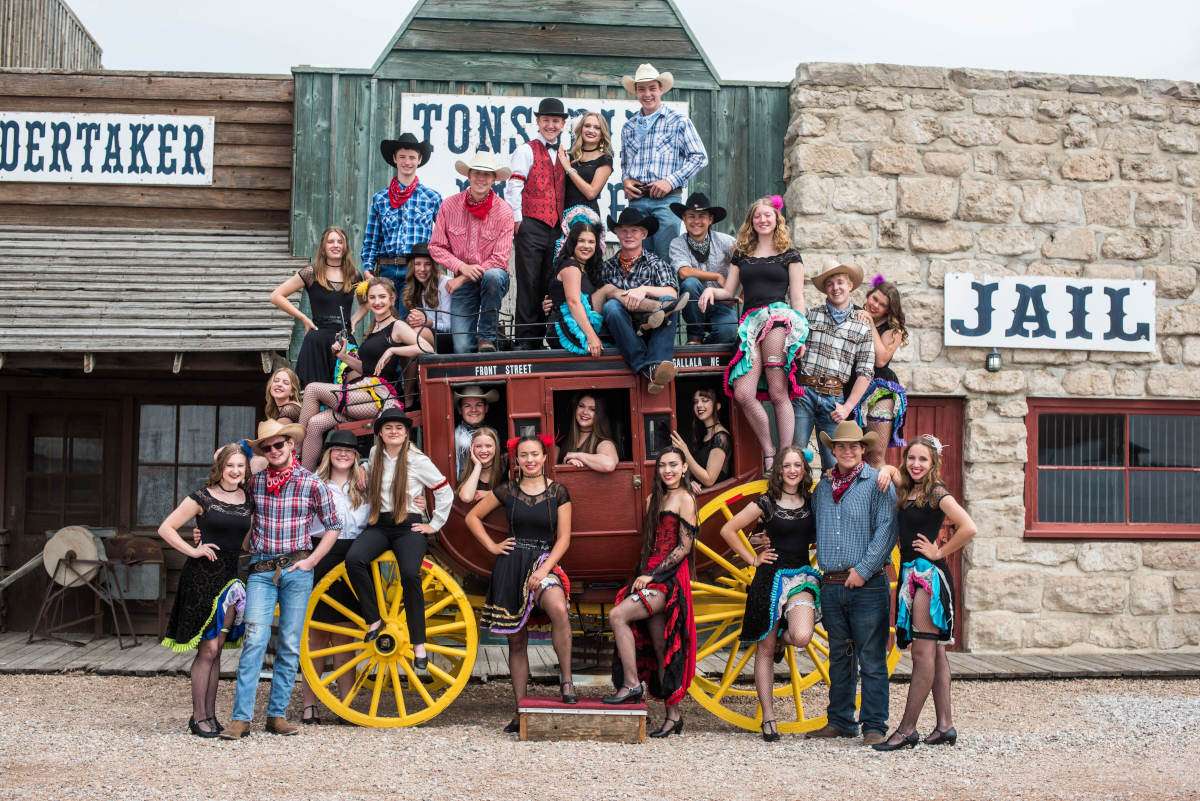 Cast of Crystal Palace Revue in front of  Front Street. (Photo Front Street Official Website)