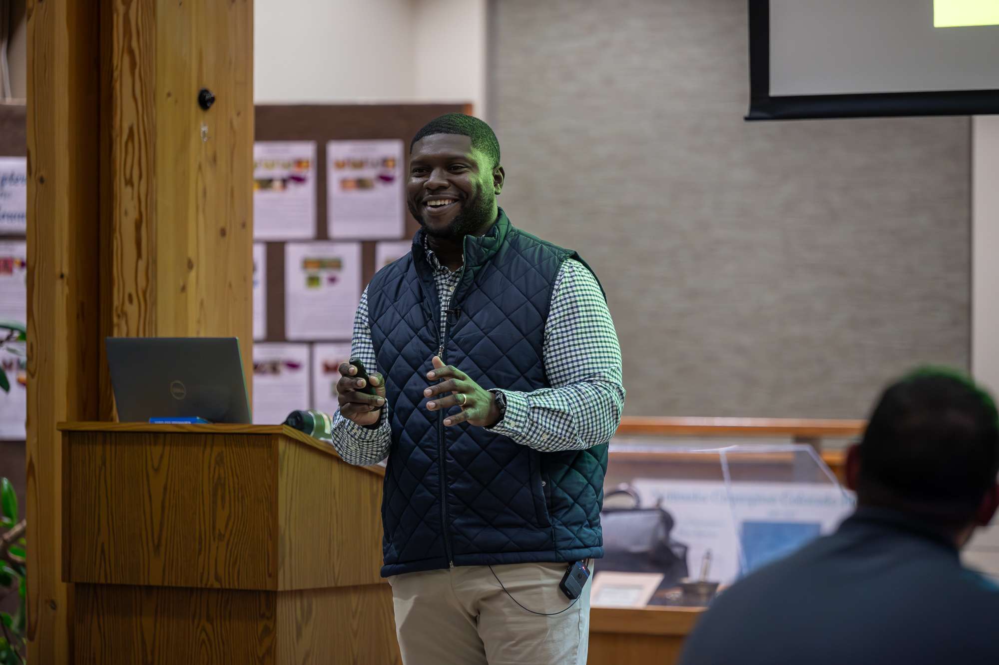 Academic Advisor for Upward Bound Kevin Coy, Jr. presents 'Rooted in Resilience,' a segment of the Graves Lecture Series in the Mari Sandoz High Plains Heritage Center Chicoine Atrium, Oct. 21, 2025. (Photo by Sydney Brown/Chadron State College)