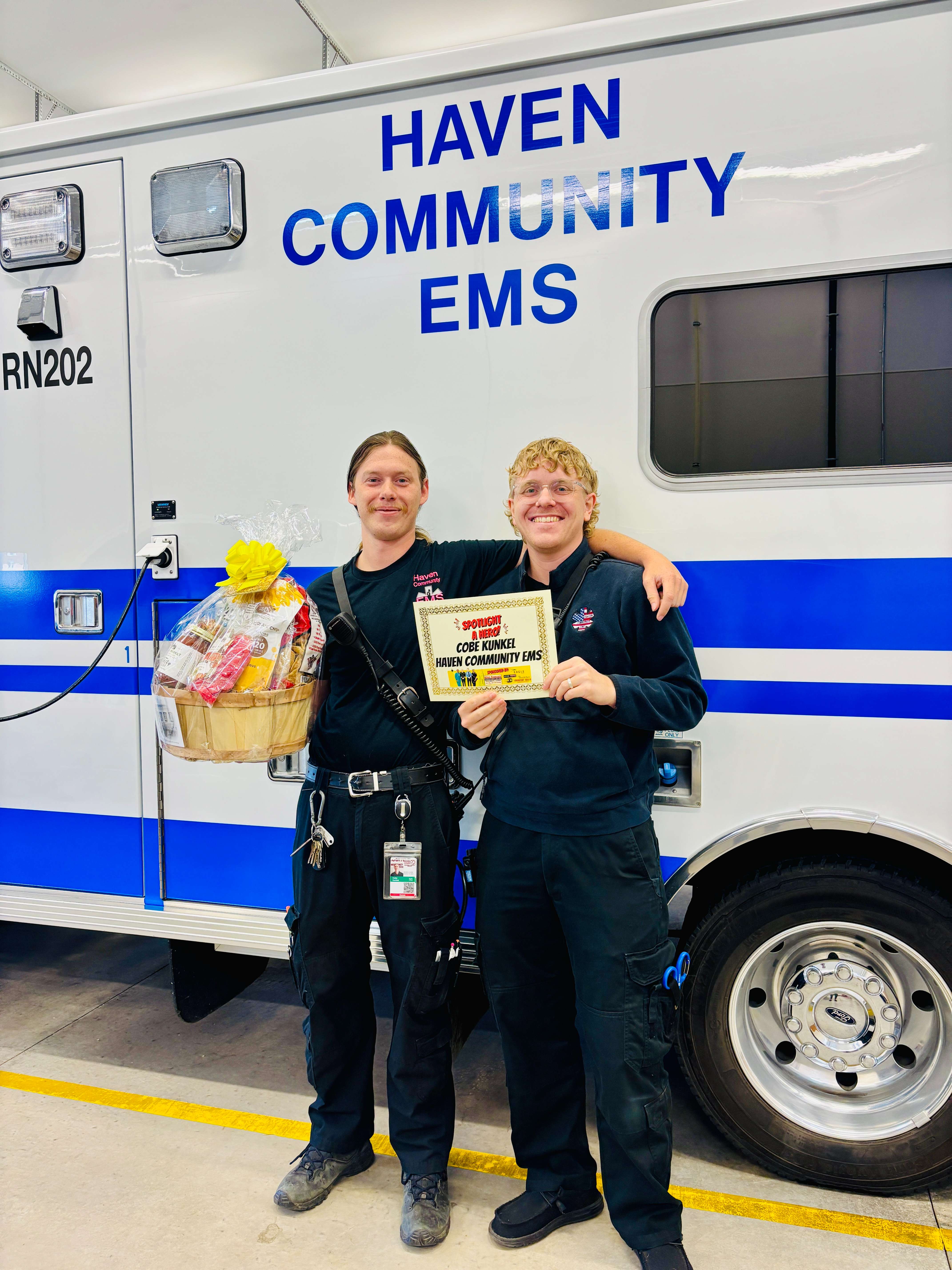 Haven Community EMS Paramedic Cobe Kunkel, left, was honored with the First Responder of the Month for October, presented by Eagle Media and Allen Samuels Chrysler Dodge Jeep Ram. He is pictured here with EMT Dakota Isaacson, right. (Hutch Post Photo)