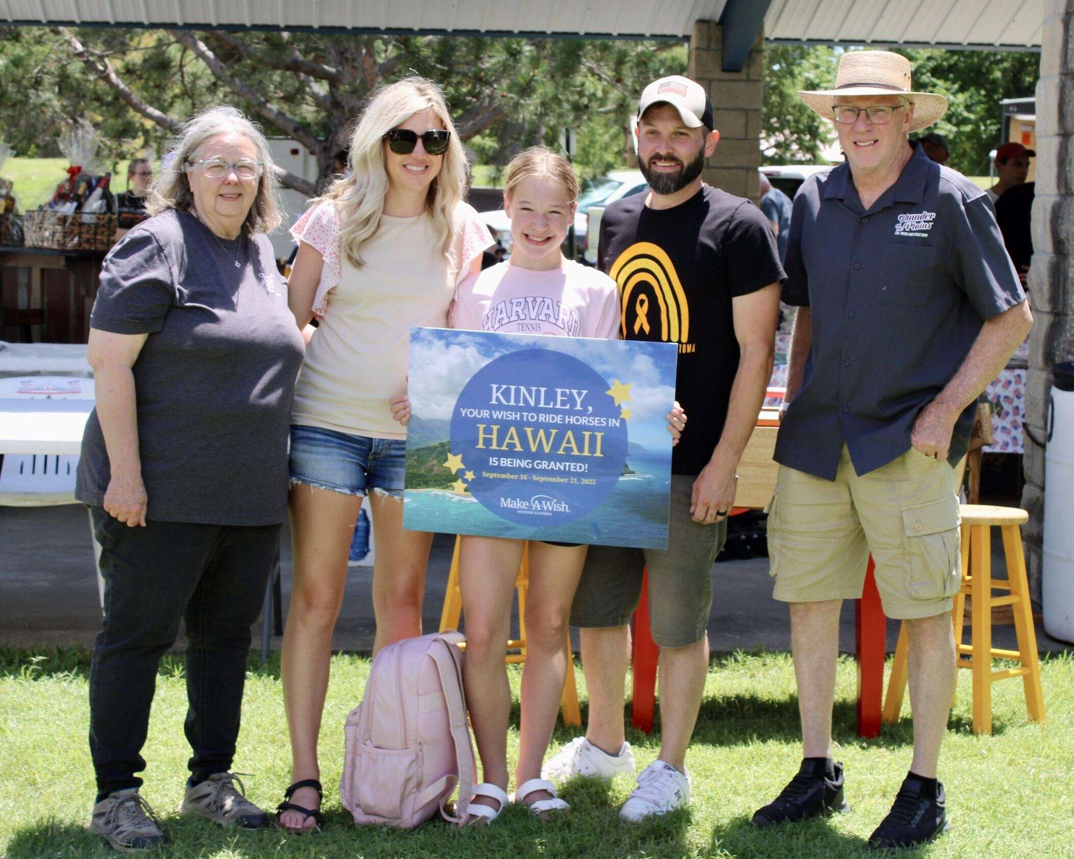 12-year-old Kinley Niernberger of Hays with her parents, getting her wish granted at the Thunder on the Plains. Photo By Tony Guerrero/Hays Post