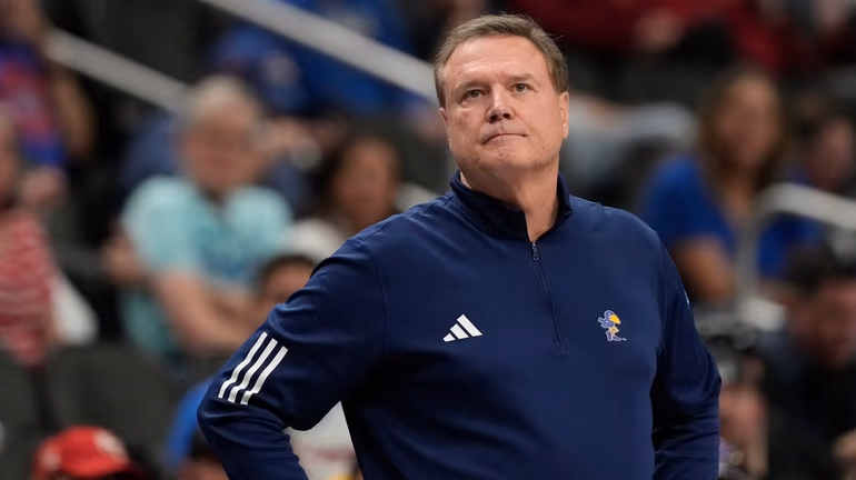 Kansas head coach Bill Self rects on the sidelines during the second half of an NCAA college basketball game against UCF in the second round of the Big 12 Conference tournament, March 12, 2025, in Kansas City, Mo. (AP Photo/Charlie Riedel, File)