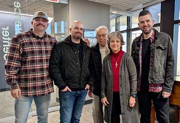 Marilee McBoyle-Wiesner, M.D., stands with her family. <b>From left to right</b>- sons Tom and Thaddaeus,  husband Tim and son Tim Jr. Courtesy photo