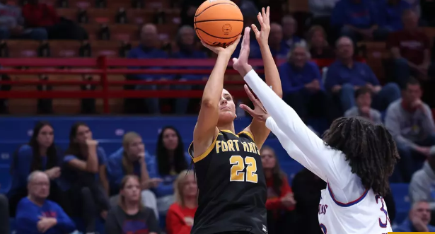 Fort Hays State's Telexa Weeter (22) attempts a shot over Nadira Eltayeb (33) of Kansas in an exhibition game on Wednesday, October 29, 2025 in Lawrence, Kan. (FHSU Athletics photo/Parker Nisbeth)