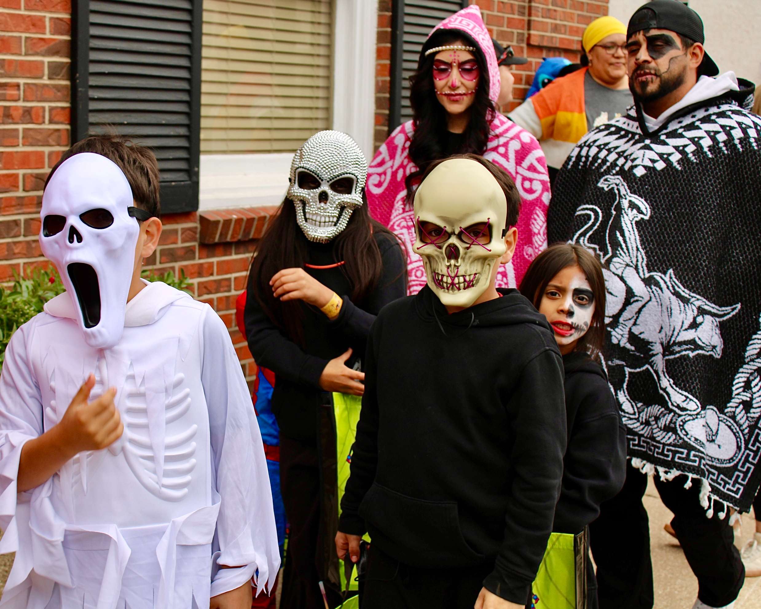 A group of trick-or-treaters in costume in downtown Hays. Photo by Tony Guerrero/Hays Post