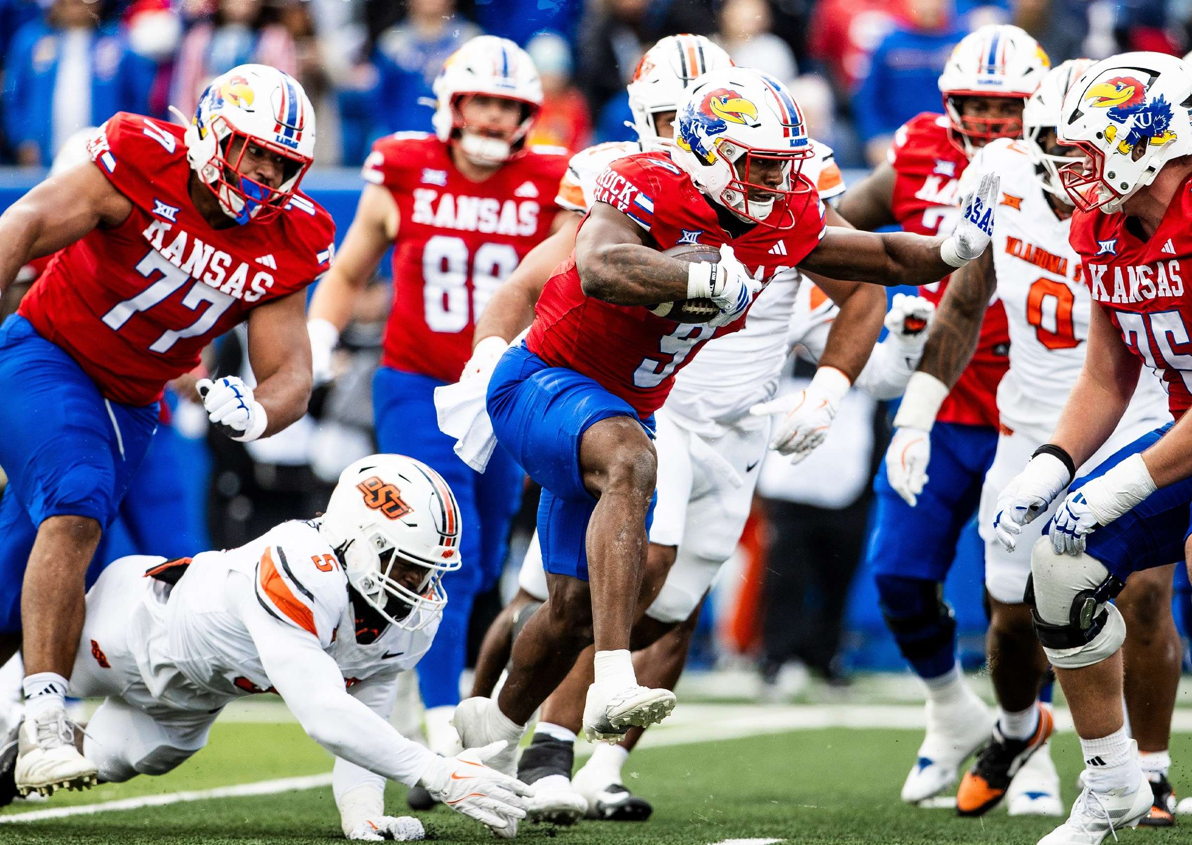 Daniel Hishaw Jr. rushed 14 times for 65 yards and two touchdowns as the Kansas offense came to life in the second half of a 38-21 win over Oklahoma State on Homecoming/ Photo courtesy of KU Football on X