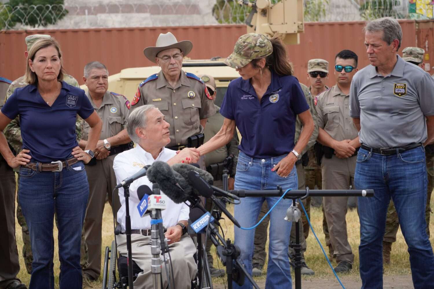  Then-South Dakota Gov. Kristi Noem, now U.S. secretary of homeland security, shakes hands with Texas Gov. Greg Abbott on Aug. 21, 2023, near the nation’s southern border. Also pictured, from left, are Gov. Kim Reynolds of Iowa and Gov. Jim Pillen of Nebraska. (Courtesy of then-Gov. Kristi Noem’s office)