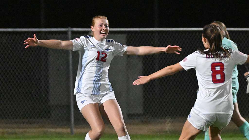 Freshman Isabell Van Fleet celebrates her goal in the 28th minute of a 1-0 Blue Dragon victory over Butler in the semifinals of the 2025 Region 6 Tournament on Wednesday at the Salthawk Soccer Complex. (Andrew Carpenter/Digital Fox Photography)
