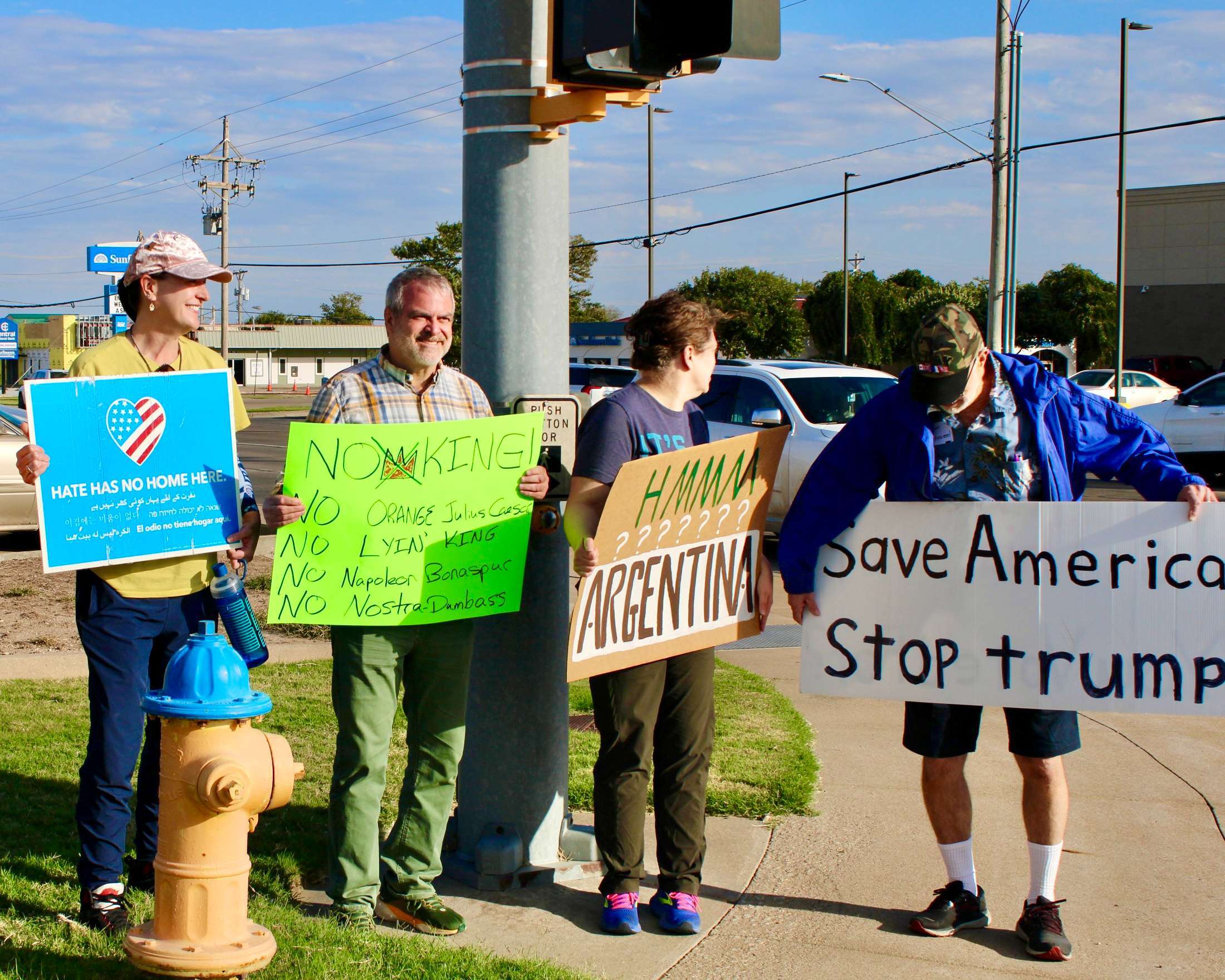 Hays City Commissioner Reese Barrick (second from left) during the Oct. 18 local No Kings protest that was part of a national anti-President Trump campaign. Photo by Anthony Guerrero/Hays Post