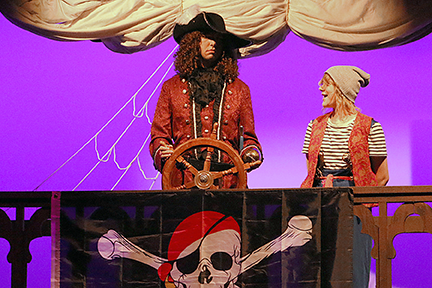 Smee (sophomore Shiloh Gaschler) tries to comfort the despondent captain (senior Bryler Russell) as he ruminates on what he perceives as his failure in his recurring battles with Peter Pan.&nbsp;Courtesy photo