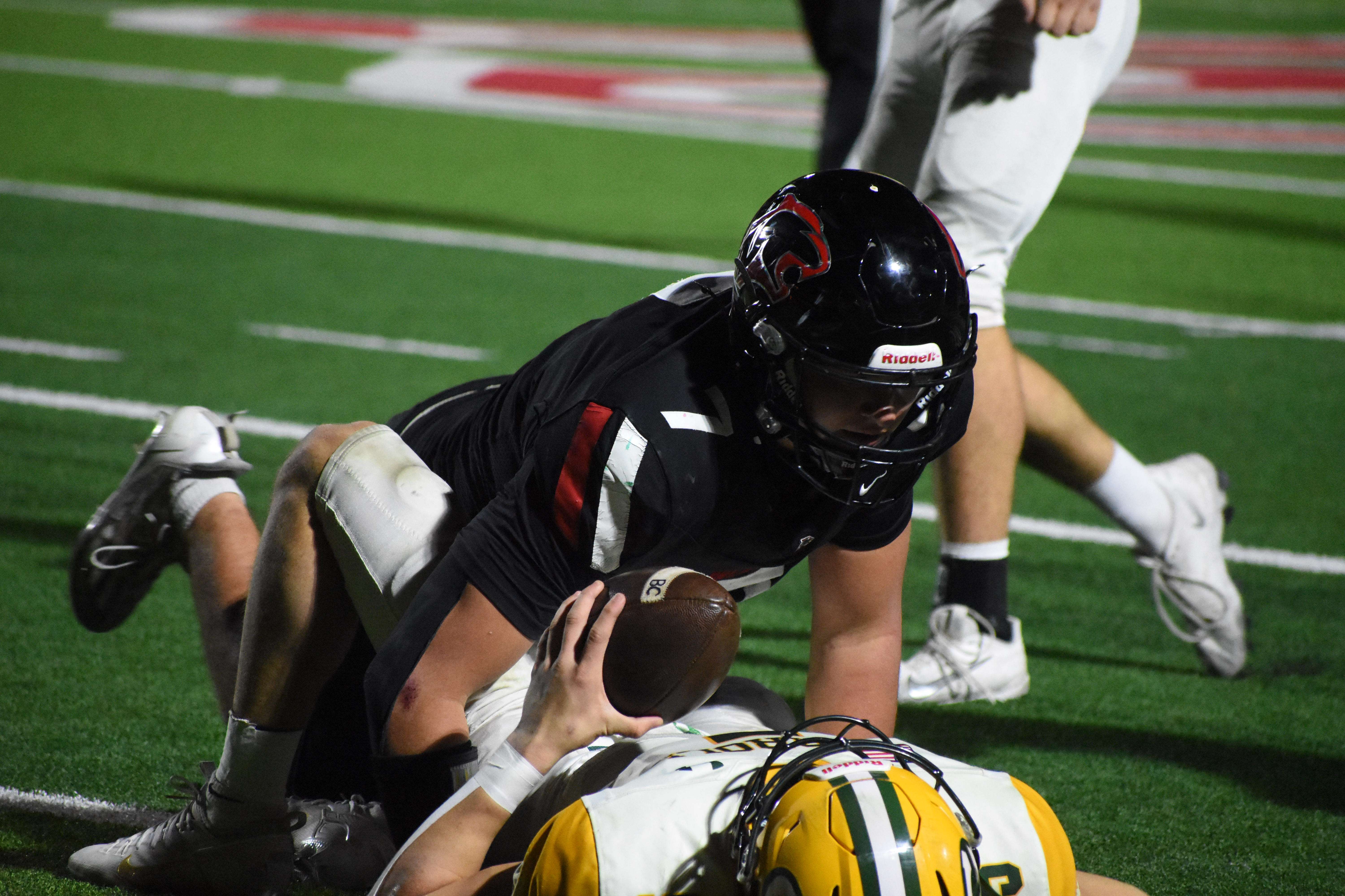 Panther junior Kale Kern records a sack in last week's Class 5A playoff game against Bishop Carroll.