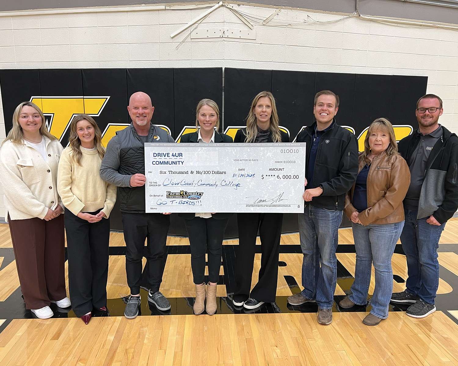 Representatives from Farm Country Ford recently presented a $6,000 check to Cloud County Community College’s Athletics Department for the Drive 4 UR Community event held in August. Pictured are, left to right: Gracie Rudolph and Linnea Perales, Cloud County Foundation; Matt Bechard, Cloud County Athletic Director; Heather Gennette, Foundation Executive Director; Amber Knoettgen, Cloud County President; Darell Gallegos, Farm Country Ford owner; Sheila Watford, Farm Country controller; and Skyler Jacobs, Farm Country sales manager. Photo courtesy of Cloud County Community College