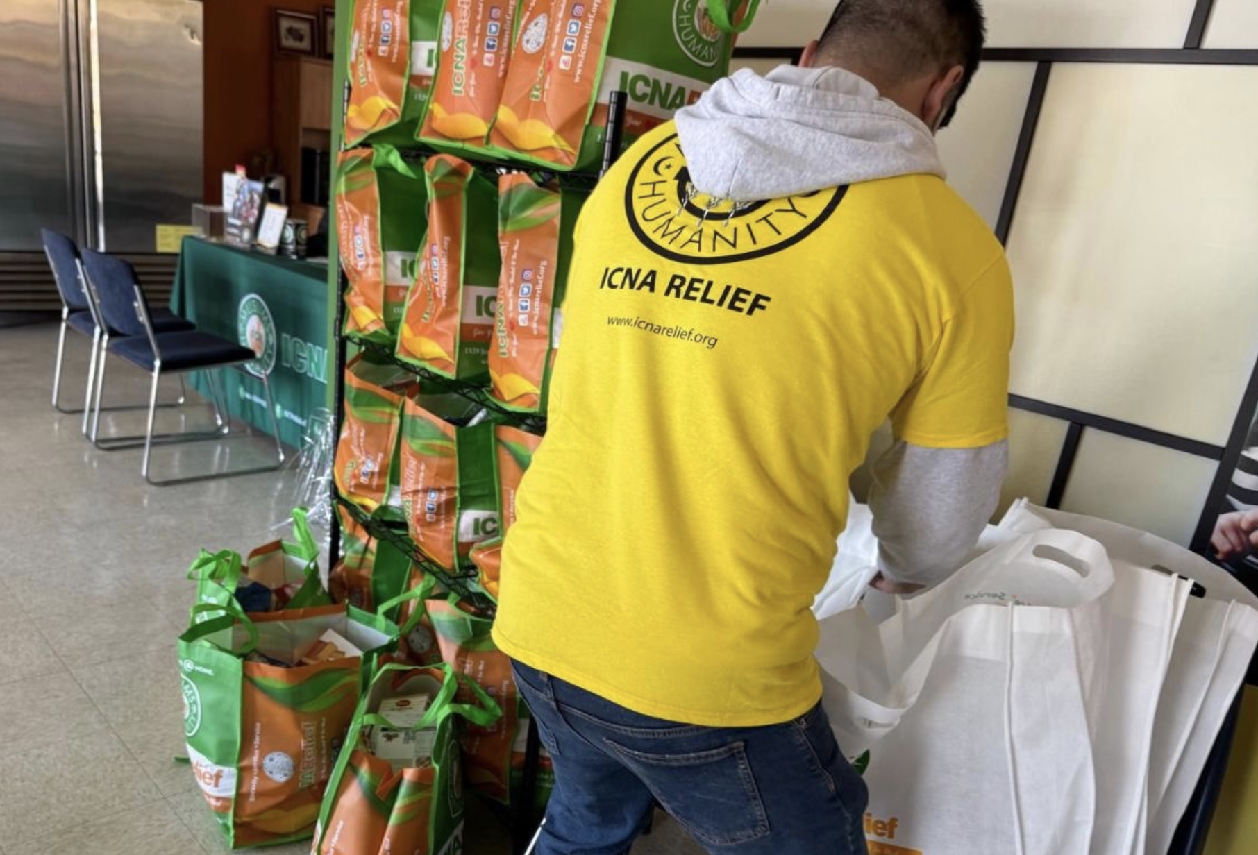 A worker prepares food packages for distribution to clients visiting ICNA Relief's food pantry in St. Louis (photo submitted).