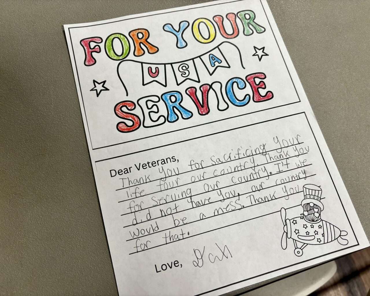 A thank you letter to veterans at the Hays VFW Veterans Day ceremony. Photo by Tony Guerrero/Hays Post