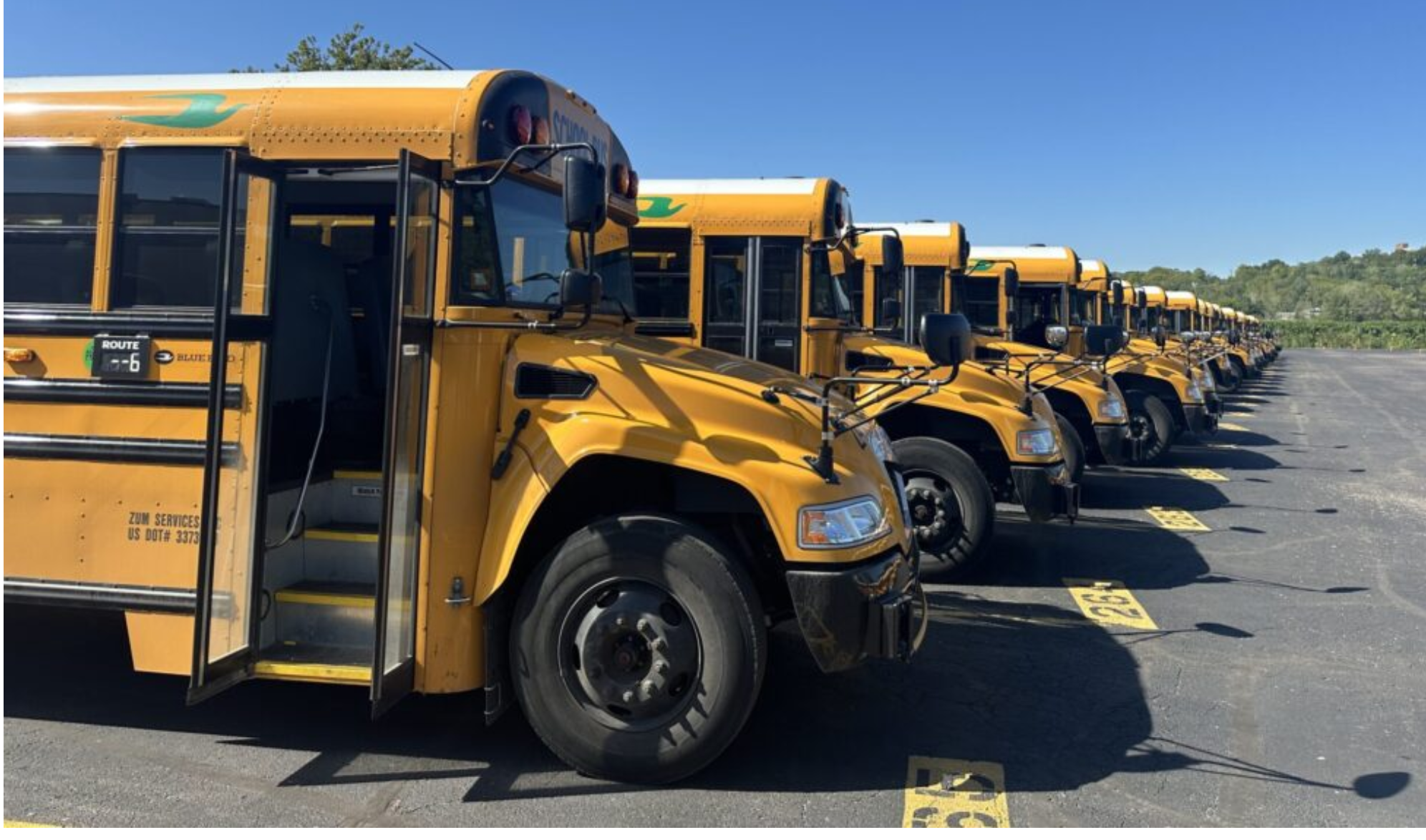 Buses are lined up at the Kansas City Public Schools bus barn in Kansas City between morning and afternoon routes. School districts have made some progress in addressing the national shortage of school bus drivers, but there still aren’t as many drivers as there were in 2019 (Kevin Hardy/Stateline).