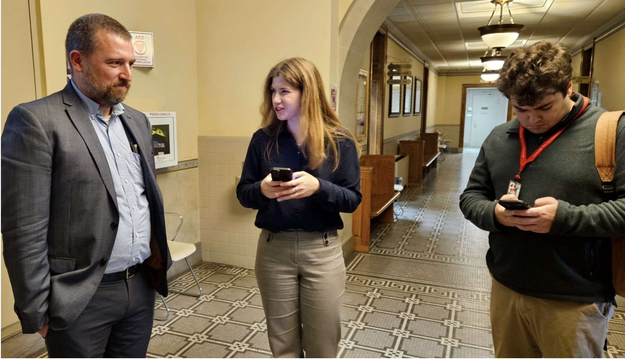 Richard von Glahn, left, director of People Not Politicians, answers questions from reporters after a trial over referendum petitions was postponed Thursday in Cole County Circuit Court (Rudi Keller/Missouri Independent).
