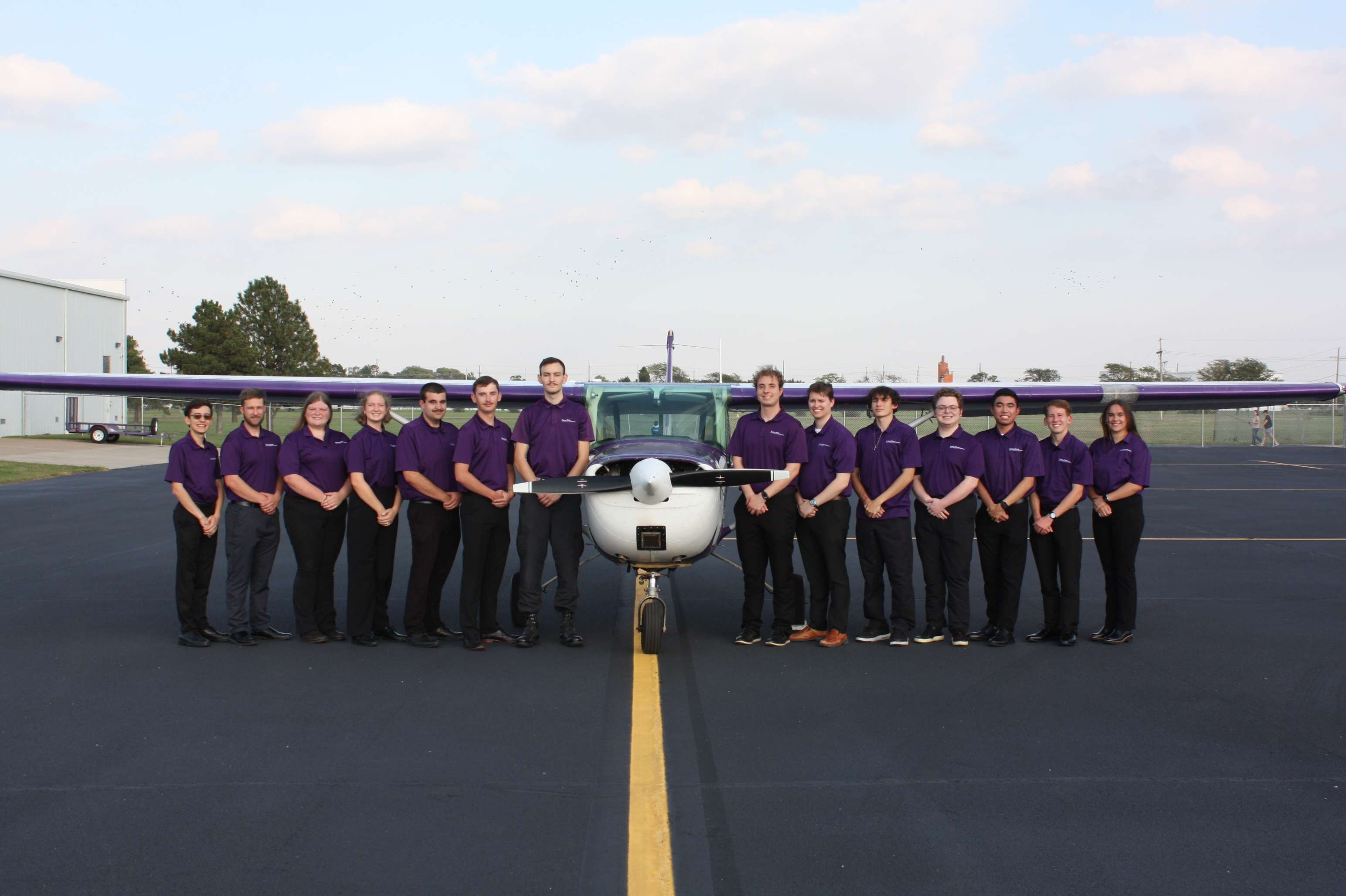 The K-State Salina Flight Team recently competed in the NIFA Region VI:VII competition. <b>Pictured from left</b>: Michael Einwich, Isaac Smith, Claire Trapp, Mac Doser, Matthew Tirella, Nathan Wallace, Luke Dufort, Daniel Novovesky, Gavin Bowman, Logan Dobransky, Mary Barbour, Timothy Mallari, Alex Mercy, and Lauren LaFountain. Courtesy of KSU Salina 