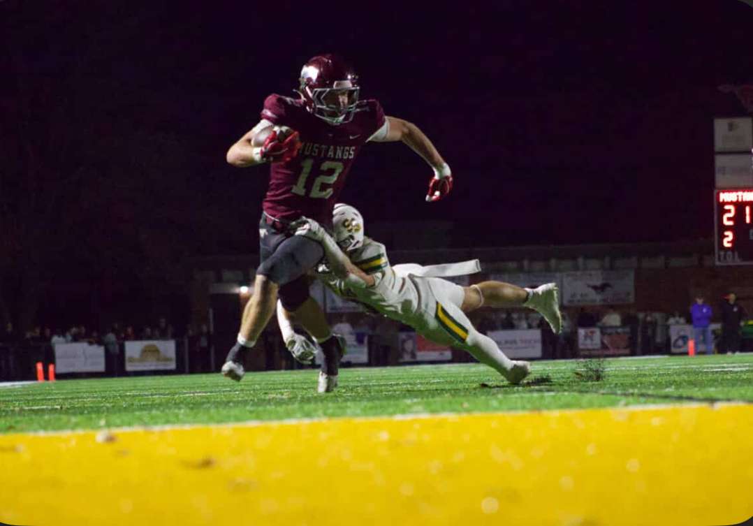 Cooper Reves breaks a tackle on his way to a Central touchdown. Photo courtesy of Kaiden Comeau.