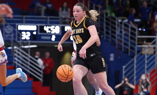 Fort Hays State guard Olivia Mortenson (10) brings the ball up the floor in an exhibition game against Kansas on Wednesday, October 29, 2025 in Lawrence, Kan. (FHSU Athletics photo/Parker Nisbeth)