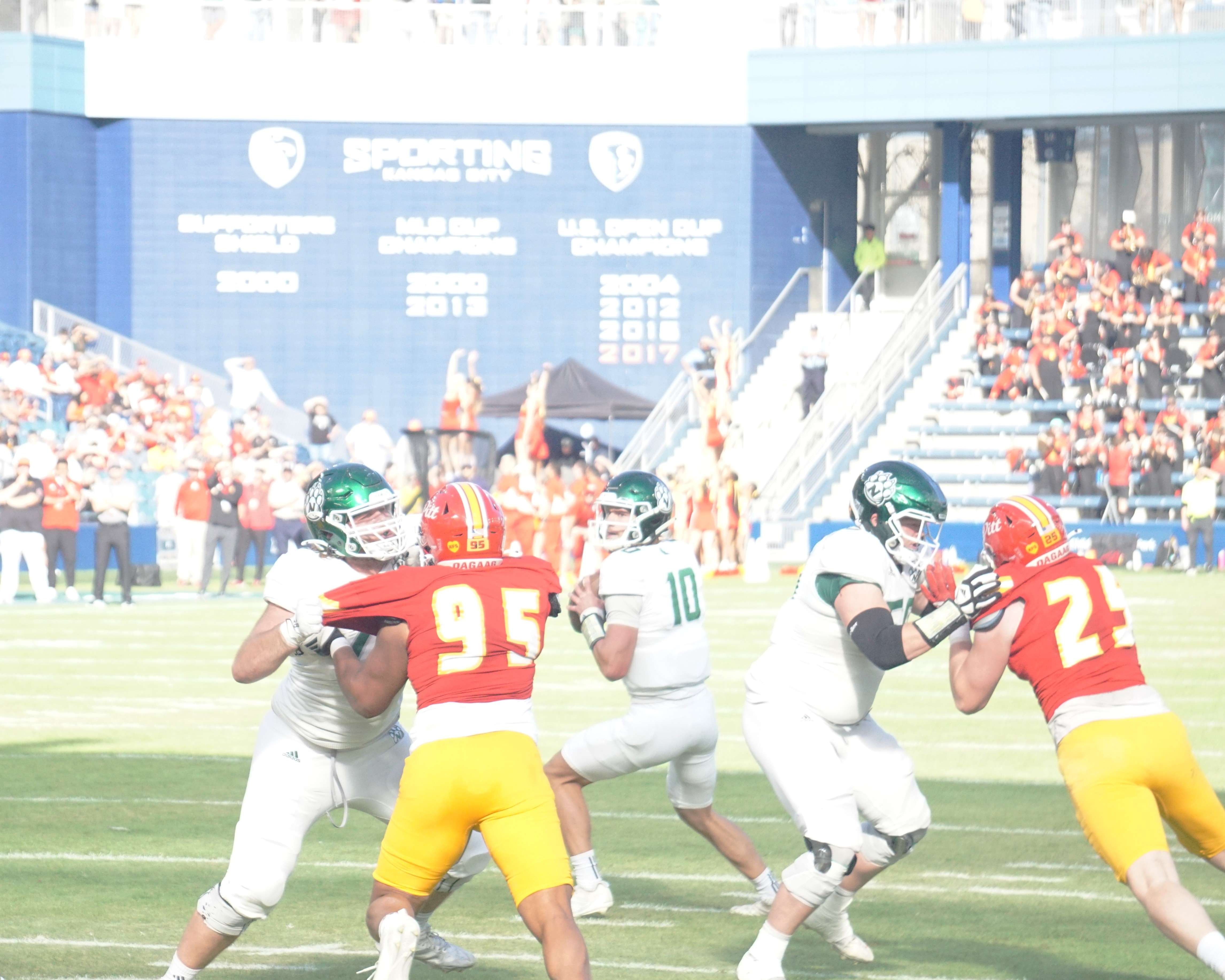 Zechariah Owens (10) drops back for a pass/ Photo by Matt Pike