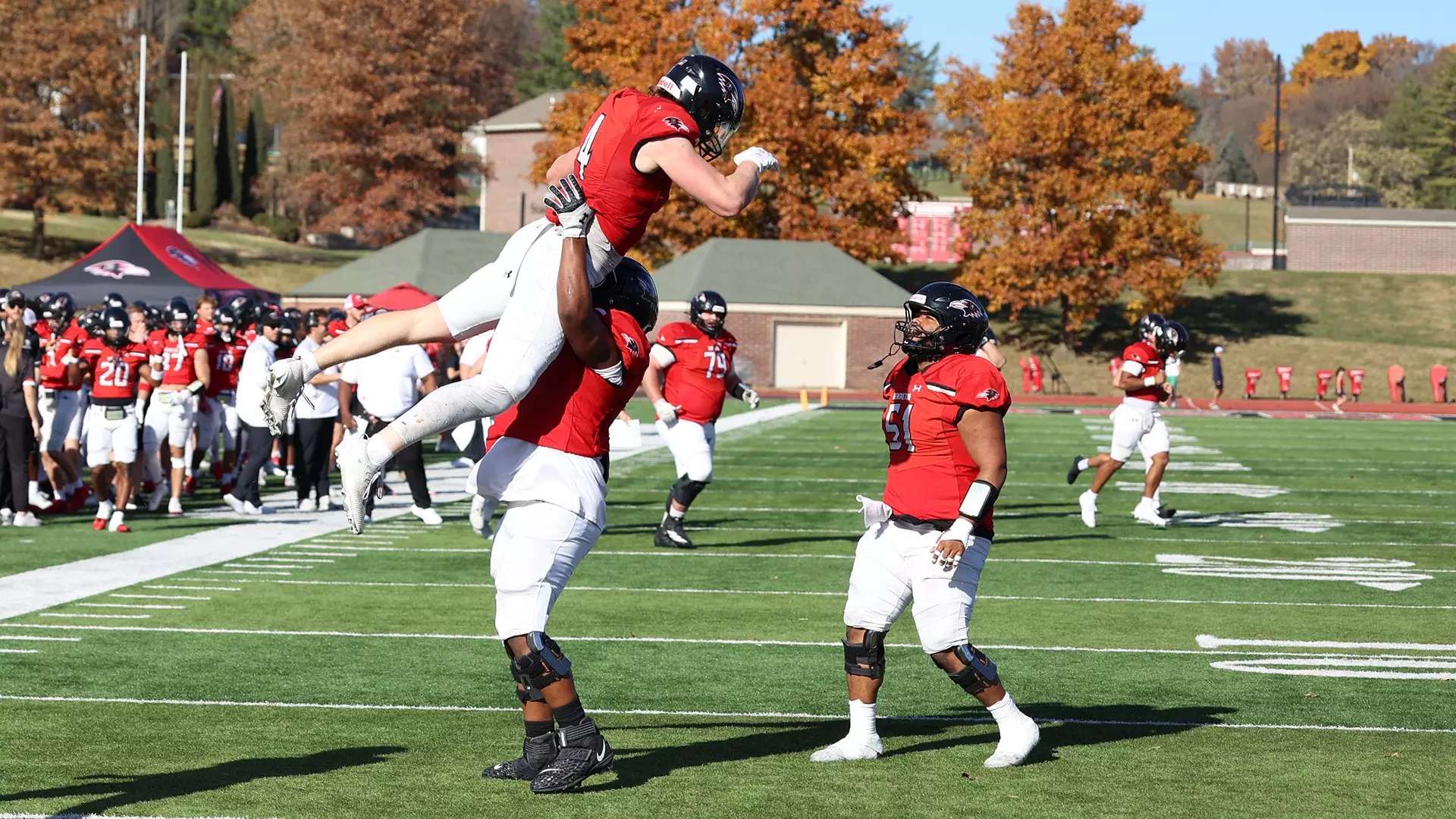 The Benedictine Ravens celebrated closing out a dominant season with a Heart South championship after beating MidAmerica Nazarene 52-7/ Photo courtesy of Bridget O’Sullivan- Raven Athletics
