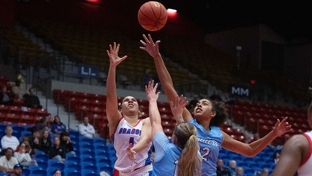 Whitney Brown goes for 2 of her game-high 19 points in the No. 19 Blue Dragon women's basketball team's 82-59 victory over Otero in the Hutch Women's "BreatheFire" Classic on Saturday at the Sports Arena. (Andrew Carpenter/Digital Fox Photography)