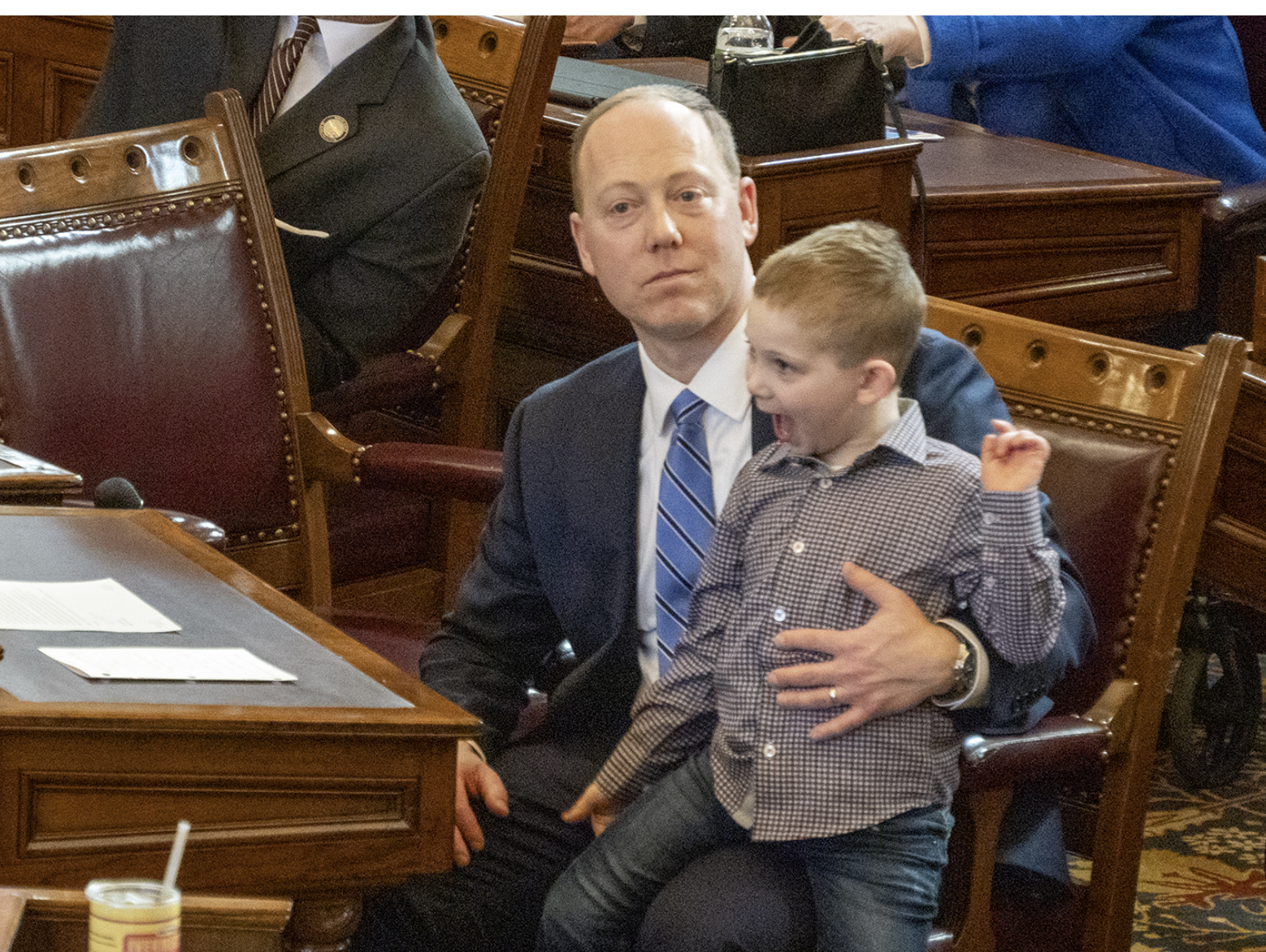 Kansas state Sen. Ethan Corson of Fairway, a Democratic candidate for governor in 2026, receives the endorsement of Gov. Laura Kelly. In this image from Jan. 13, 2025, Corson sits in the Kansas Senate chamber. (Photo by Sherman Smith/Kansas Reflector)