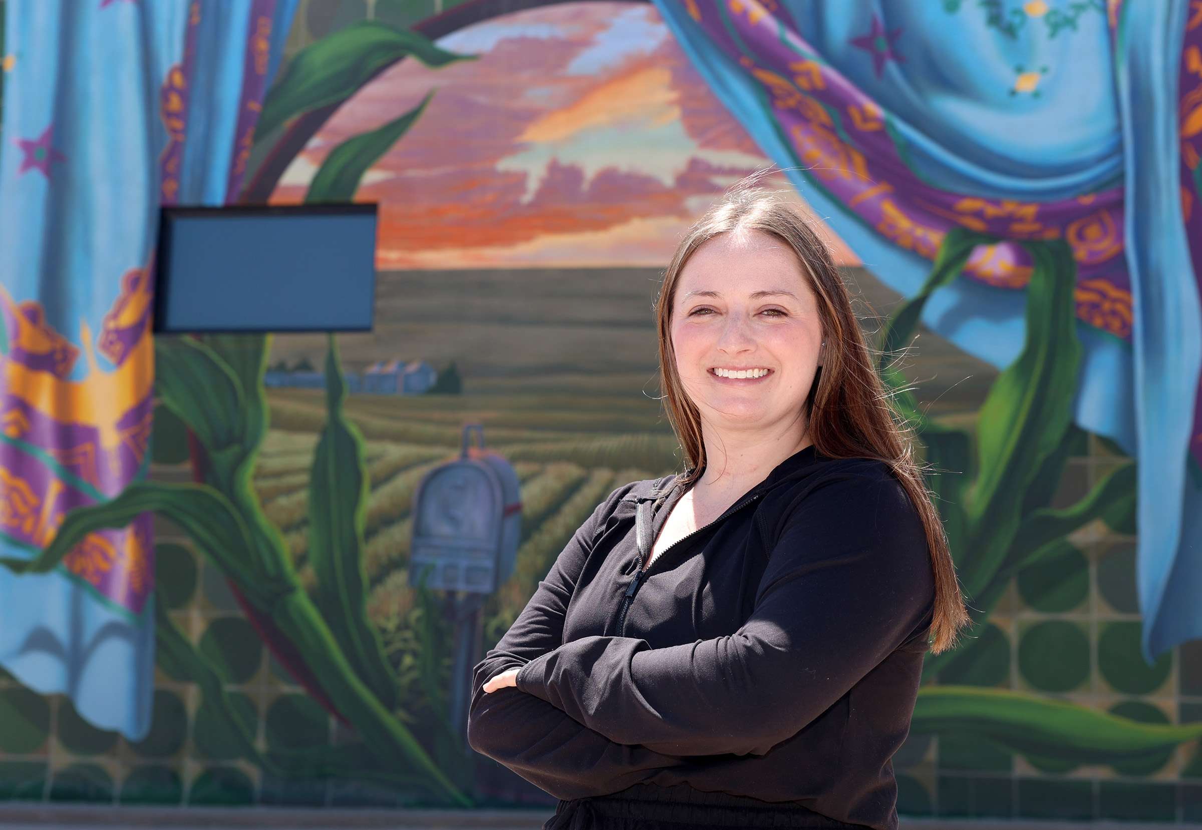 A former kindergarten teacher, McKenna Fahrenbruch now serves as director of the Holdrege Area Early Childhood Partnership. She works closely with local providers, families and businesses to improve the quality of early education, increase access and strengthen the overall child care system in the south-central Nebraska community. (Photo by Erika Pritchard, UNK Communications)