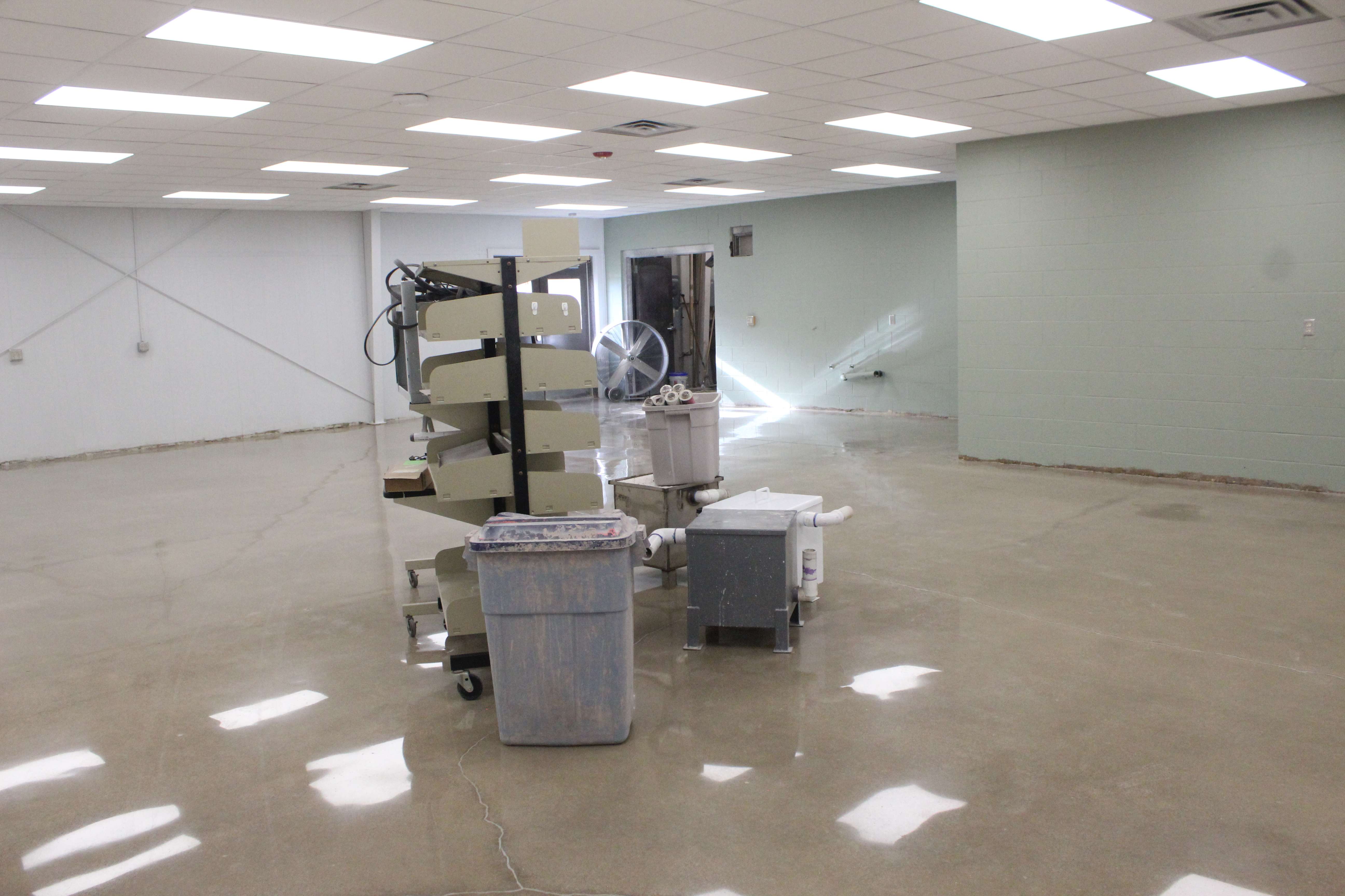 The cabinets were ripped out of the old art room and the floor redone and walls painted. New cabinets will be added.&nbsp;Photo by Cristina Janney/Hays Post