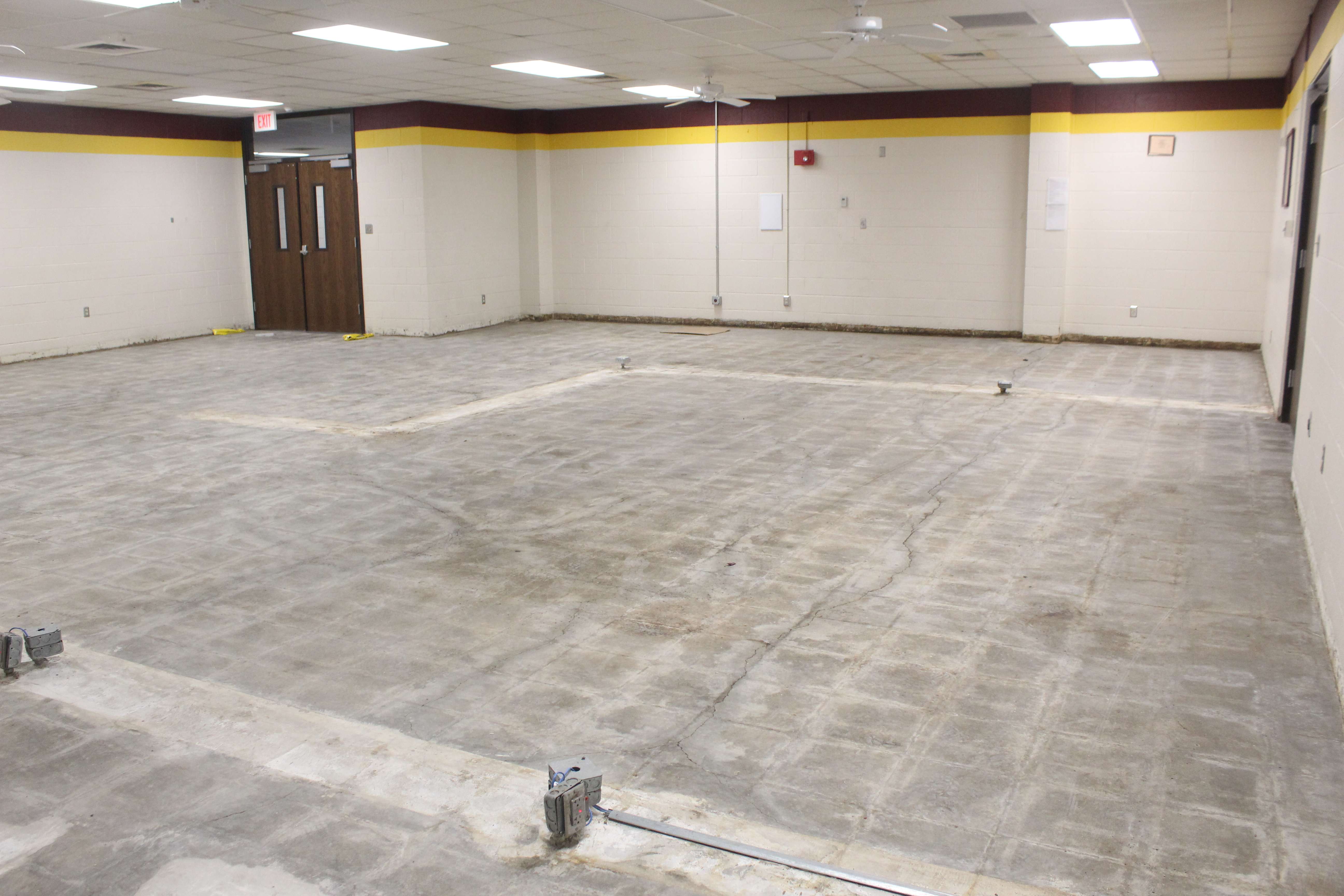 The new middle school food serving area awaits new flooring. The cafeteria should provide much-needed additional space for the middle school, said Craig Pallister, retired principal and board member-elect.&nbsp;Photo by Cristina Janney/Hays Post