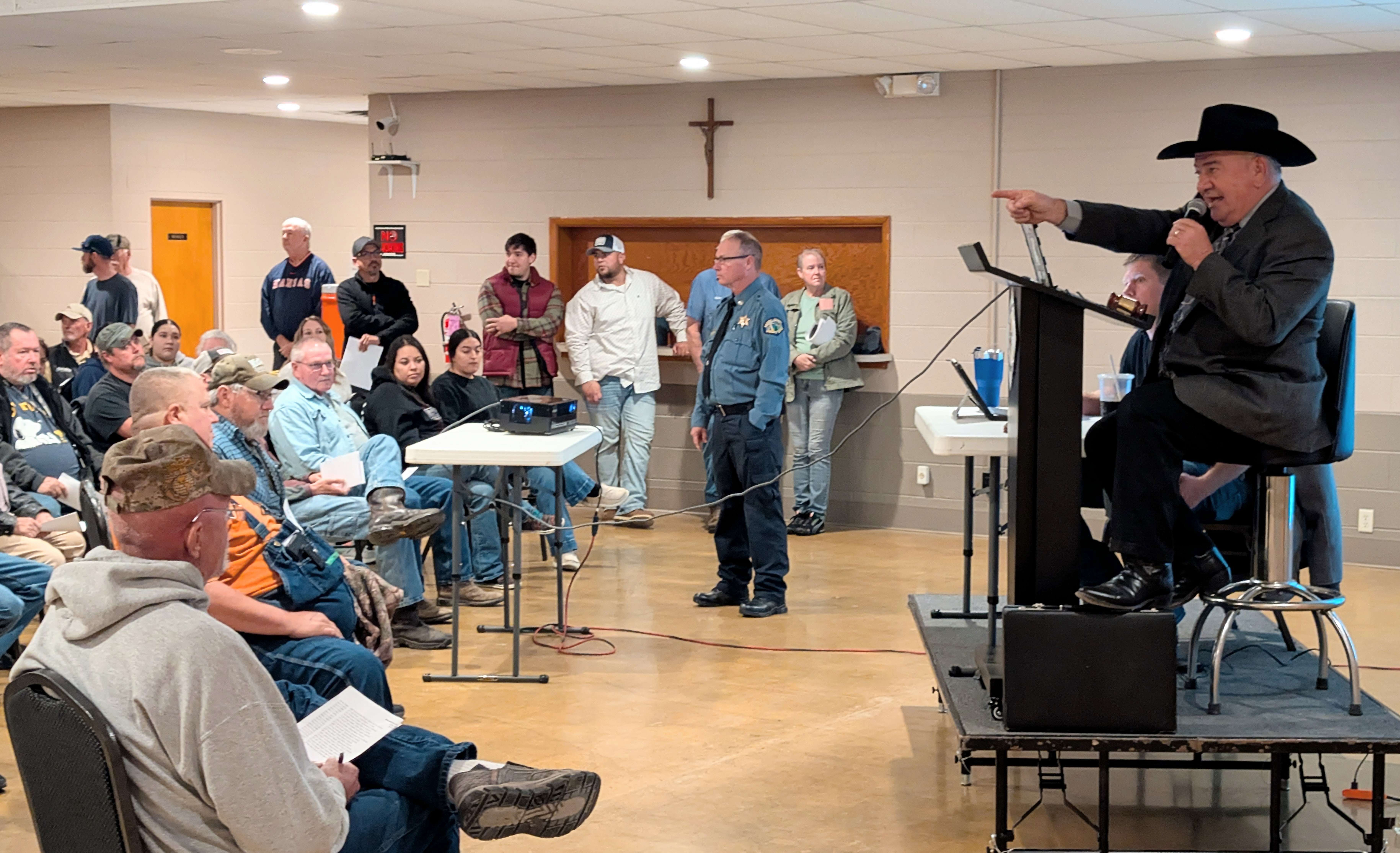 Barton County Sheriff Brian Bellendir served as auctioneer for B&amp;B Auction Services during Wednesday morning's tax sale at the Knights of Columbus in Great Bend.