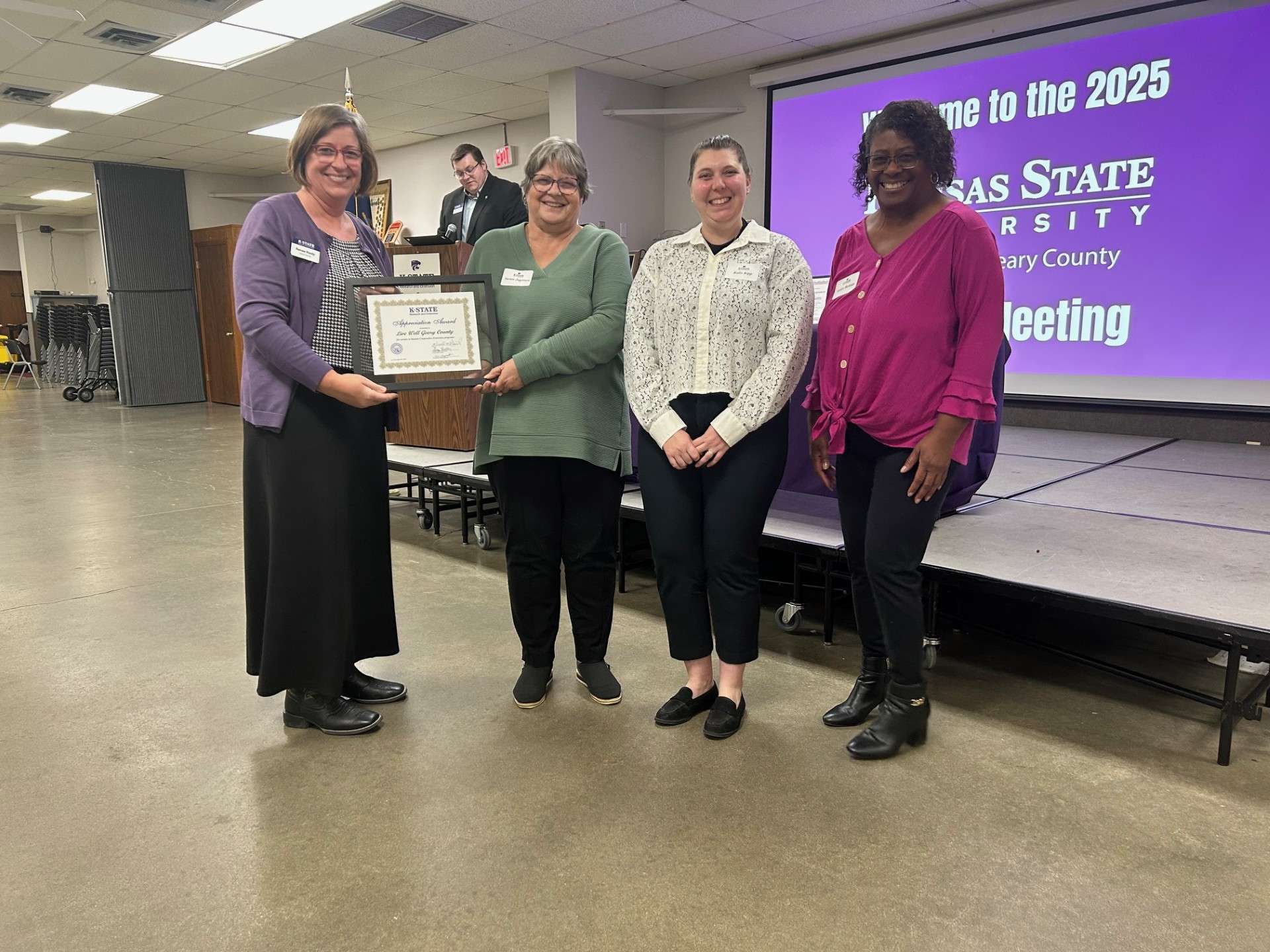 ( L-R ) Extension Agent Renae Riedy, Live Well Geary County representatives Susan Jagerson, Kalie Kipp and Vickie Bobbitt