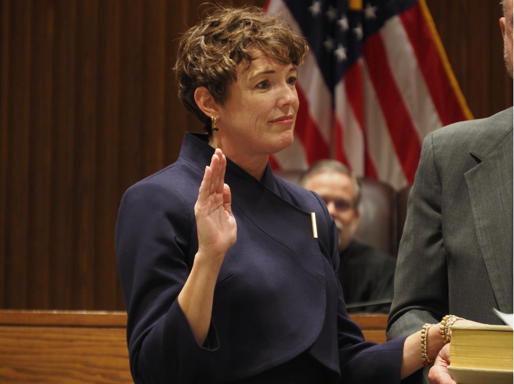 Justice Larkin Walsh is sworn in as the Kansas Supreme Court’s newest addition on Nov. 21, 2025, in Topeka. She previously worked in private practice, litigating at all levels of the judiciary, including the U.S. Supreme Court. (Photo by Anna Kaminski/Kansas Reflector)