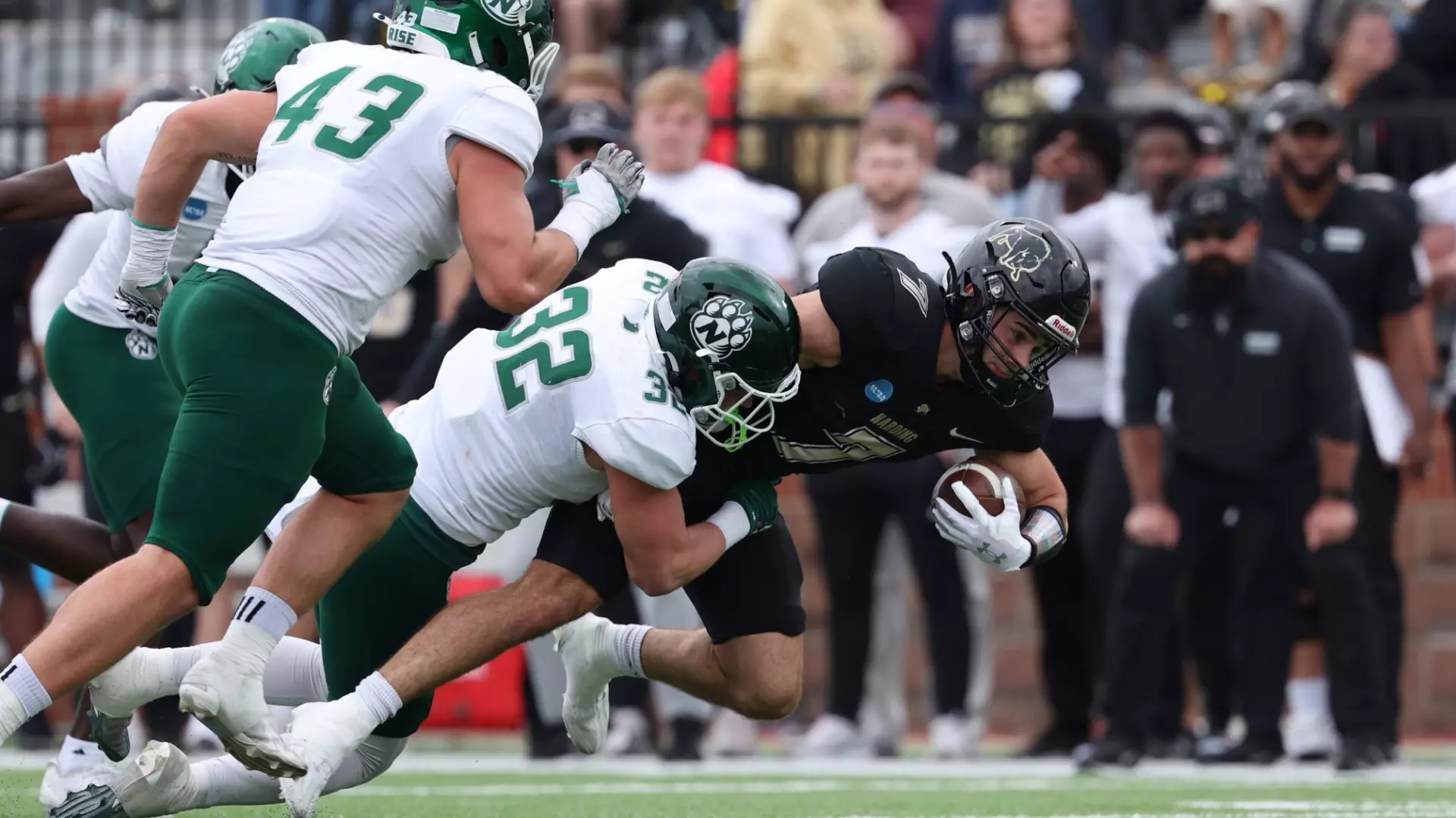Shane Fredrickson (32) makes a tackle against Harding. Northwest fell to Harding 38-16, ending their playoff run in the first round/ Photo courtesy of Aaron Hare-Northwest Athletics