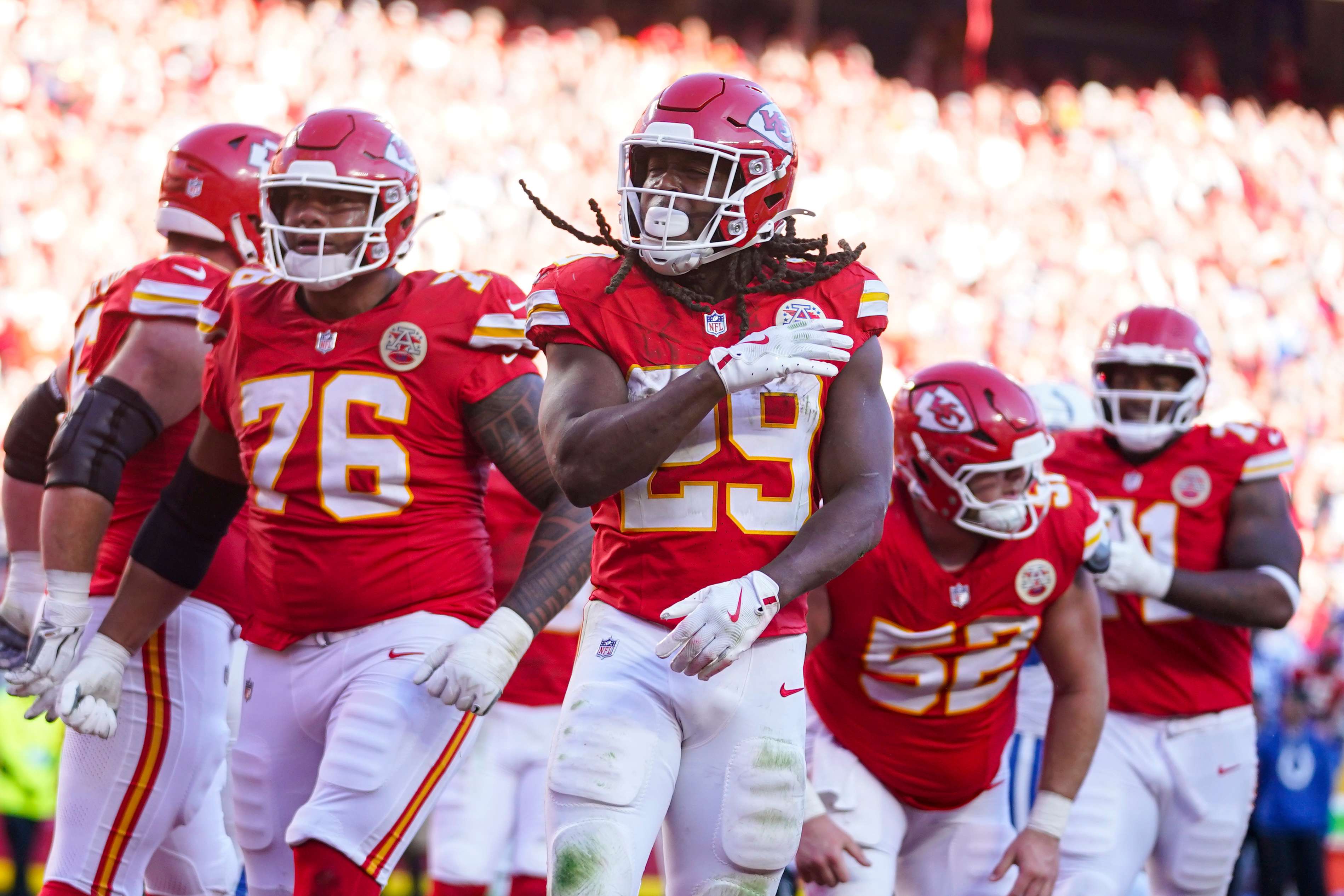 Kansas City Chiefs running back Kareem Hunt (29) celebrates after a touchdown against the Indianapolis Colts during the second half of an NFL football game Sunday, Nov. 23, 2025, in Kansas City, Mo. (AP Photo/Ed Zurga)