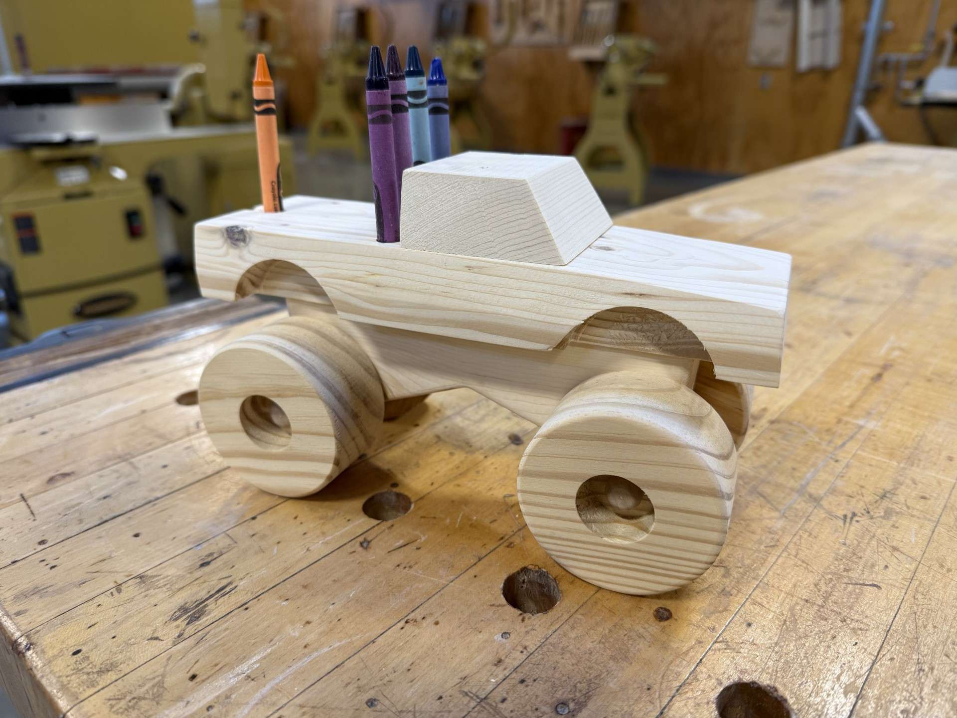 Volunteer elves are needed to build 200 monster trucks for needy Ellis County children. Picture courtesy Fort Hays State University