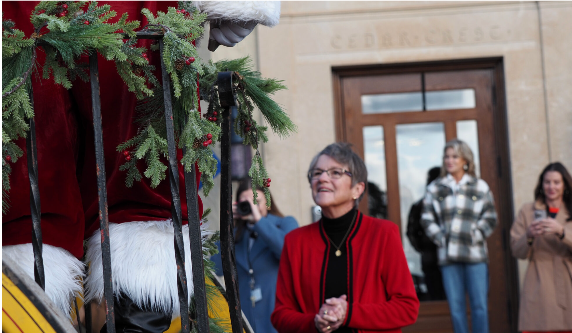 Gov. Laura Kelly welcomes Santa to the governor’s mansion on Nov. 25, 2025. (Photo by Grace Hills for Kansas Reflector)