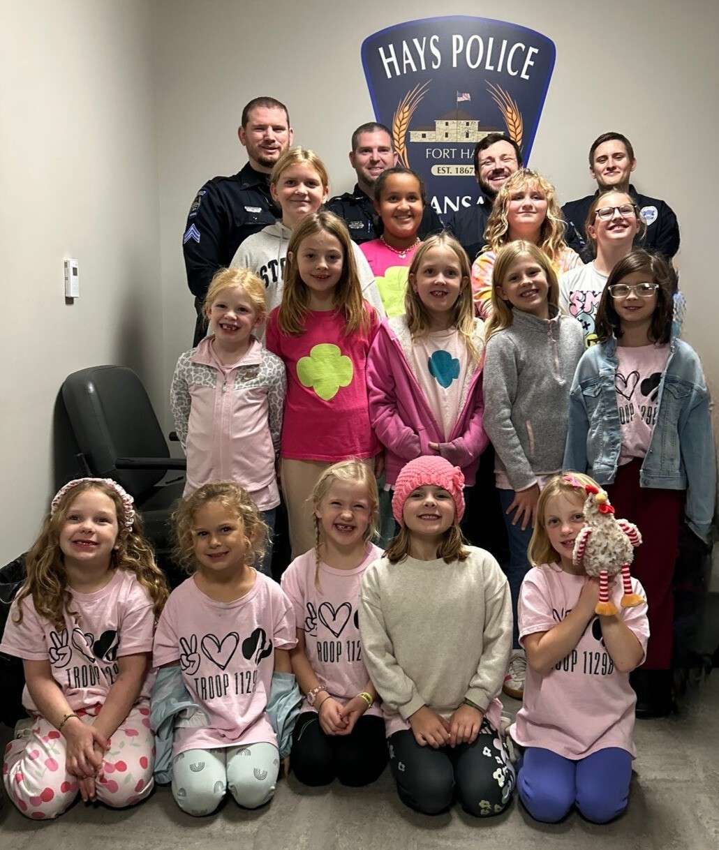 Girl Scout Troop 11298 with Hays police officers. Courtesy photo